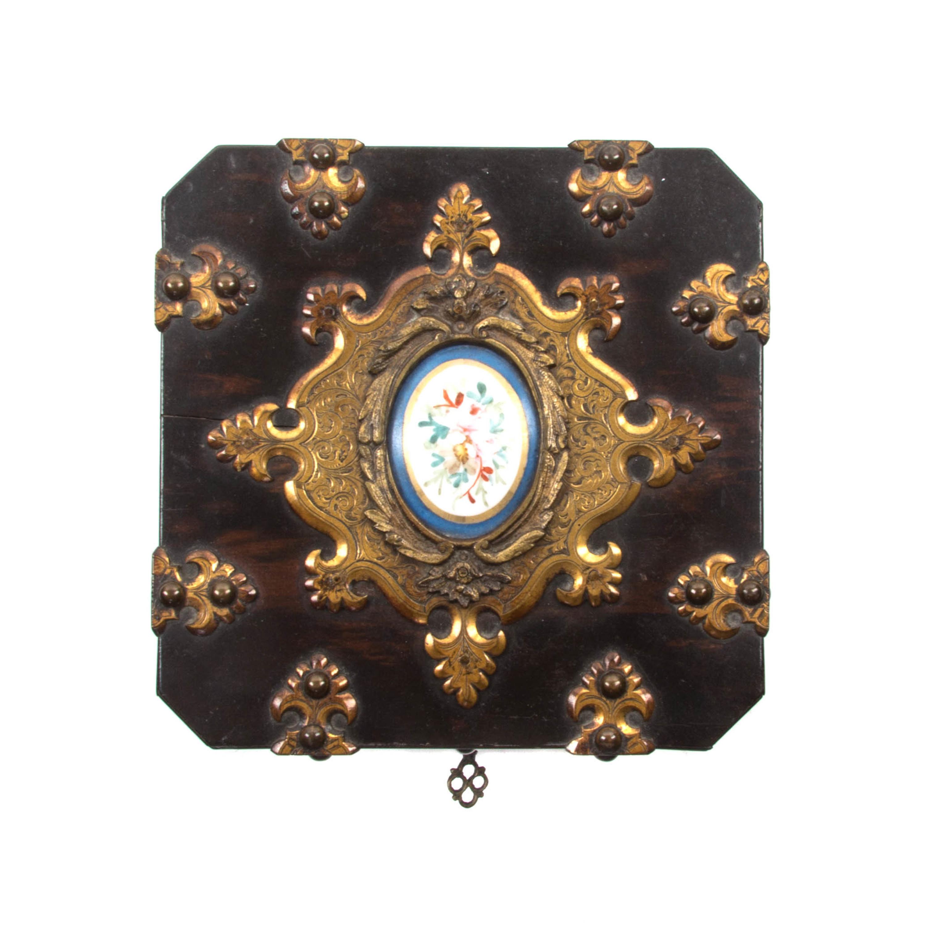 A French Brass and Porcelain Mounted Calamander Decanter Set, SECOND HALF 19TH CENTURY, Height 5 3/8 x width 5 3/4 inches. — SECOND HALF 19TH CENTURY,