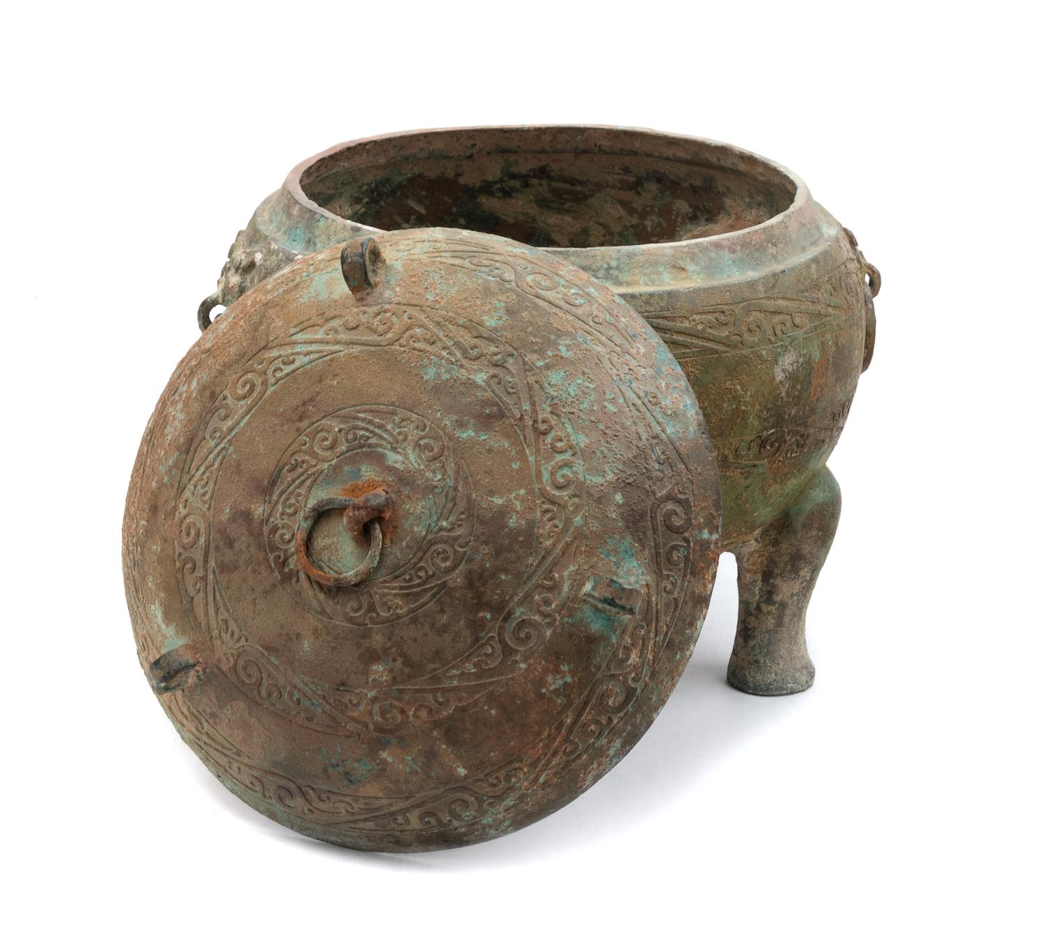 A Chinese Bronze Tripod Covered Vessel, Ding