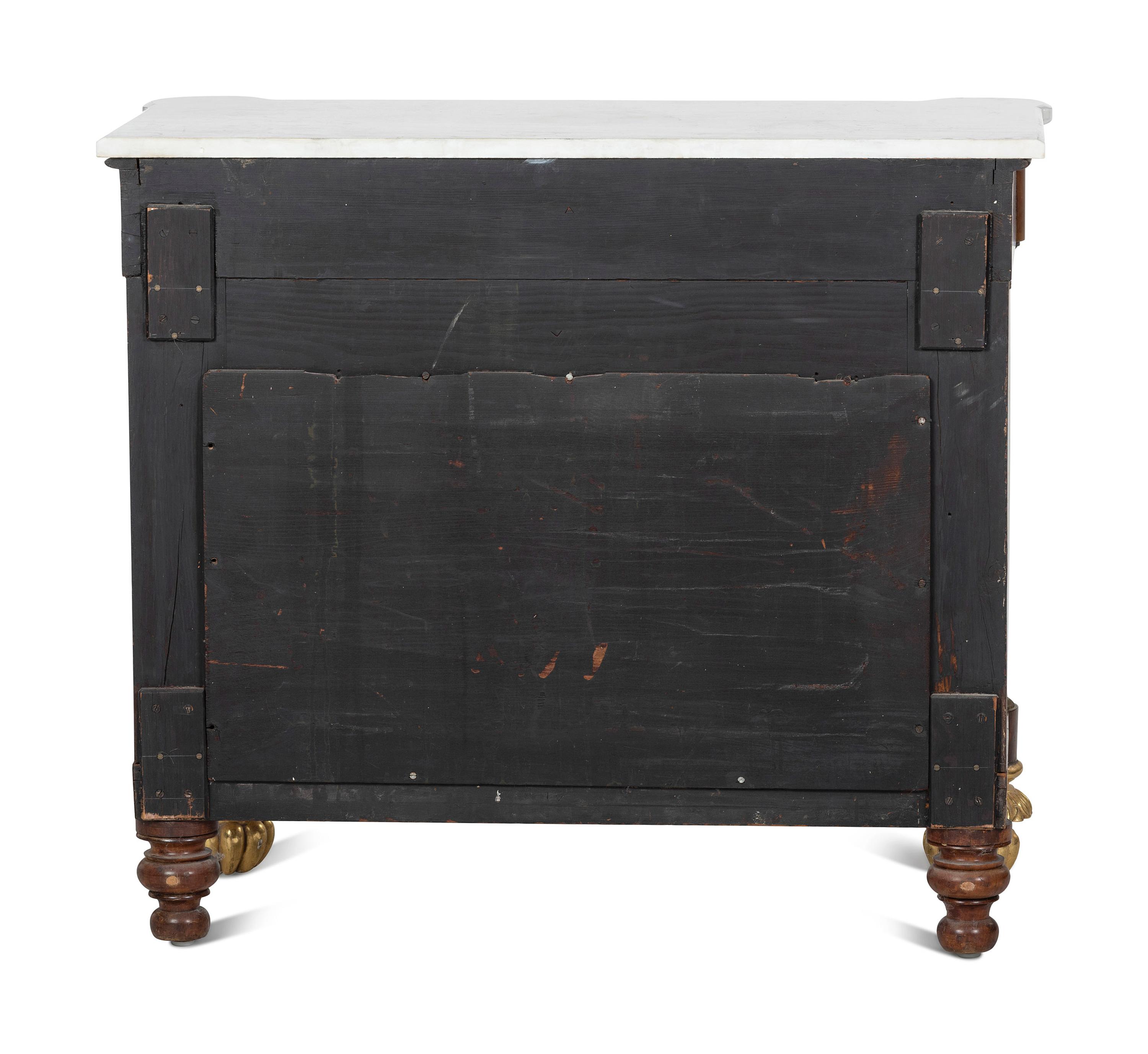 A Classical Parcel Gilt and Figured Mahogany Gilt-Metal Mounted Marble Top Pier Table