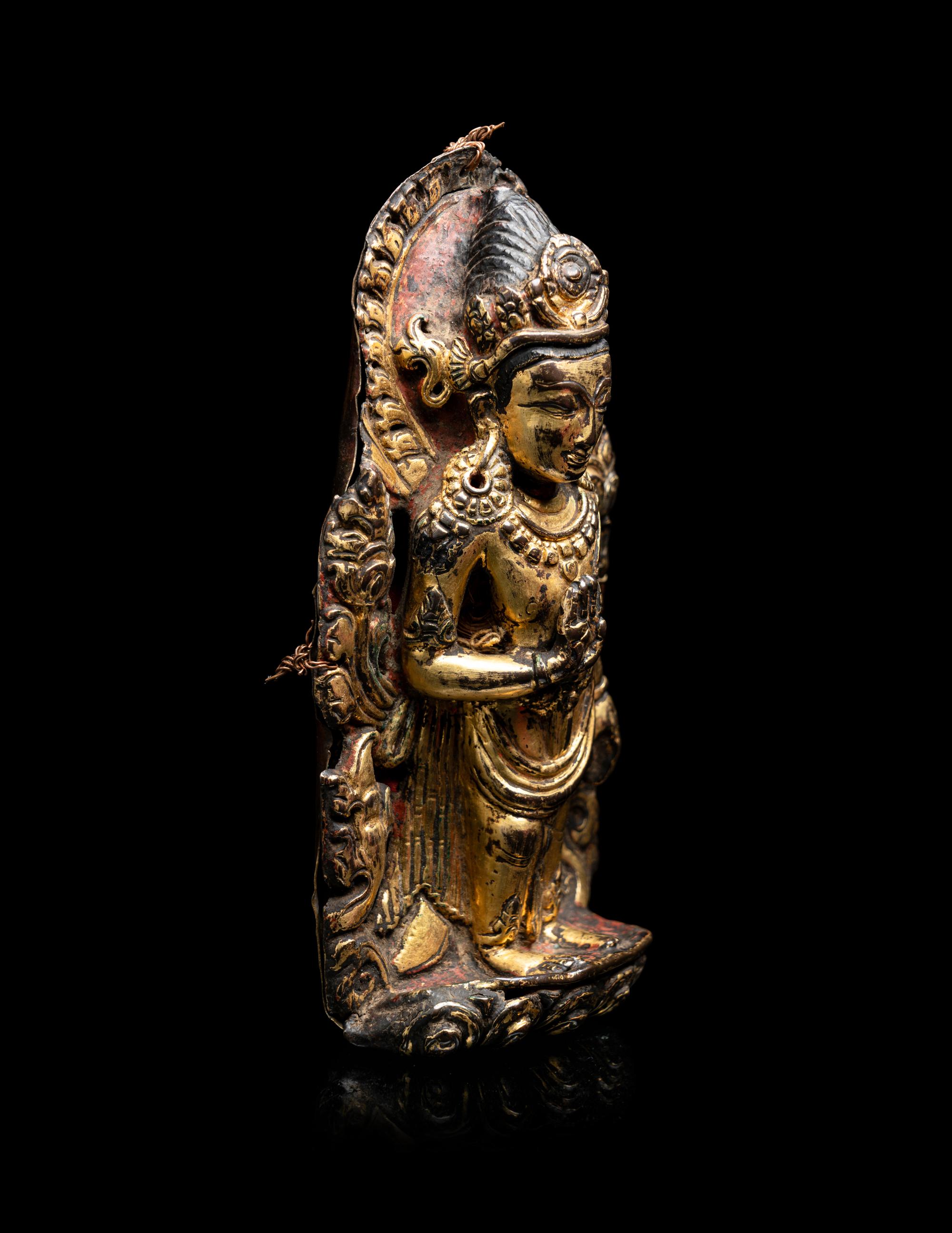 A Nepalese Gilt Copper Alloy Figure of Avalokiteshvara