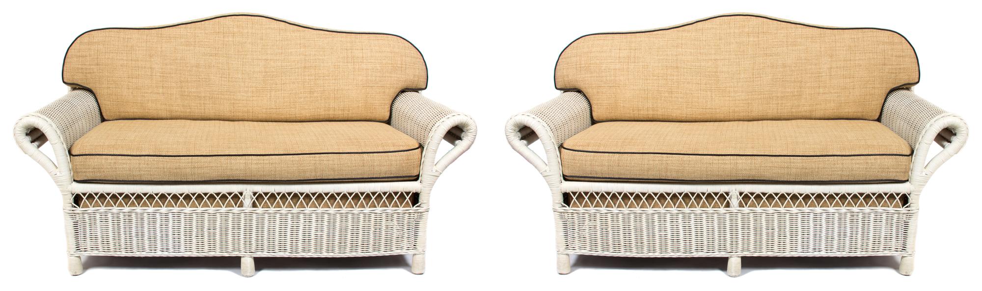 Two Brown Jordan Wicker Loveseats Height 35 x width 44 inches. — 20TH CENTURY