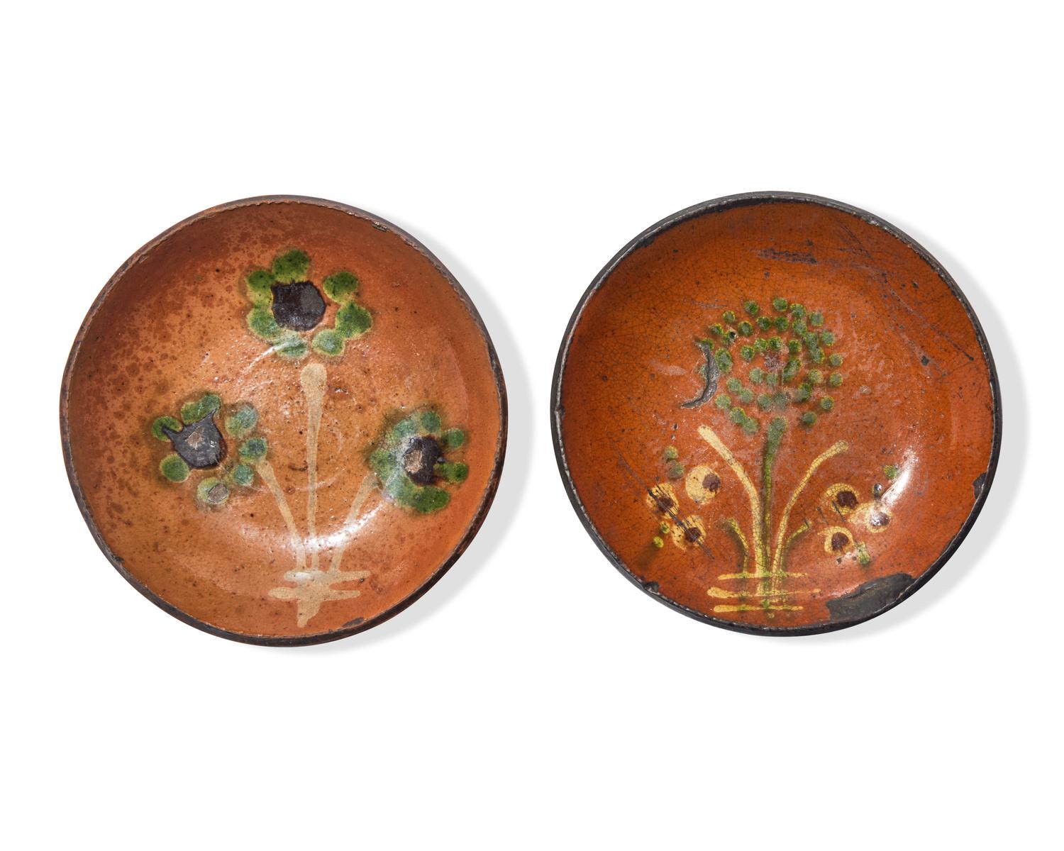 Two Small Glazed and Floral Slip-Decorated Redware Plates, Pennsylvania, 19th Century