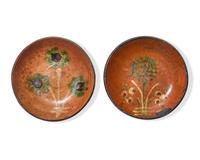 Two Small Glazed and Floral Slip-Decorated Redware Plates, Pennsylvania, 19th Century