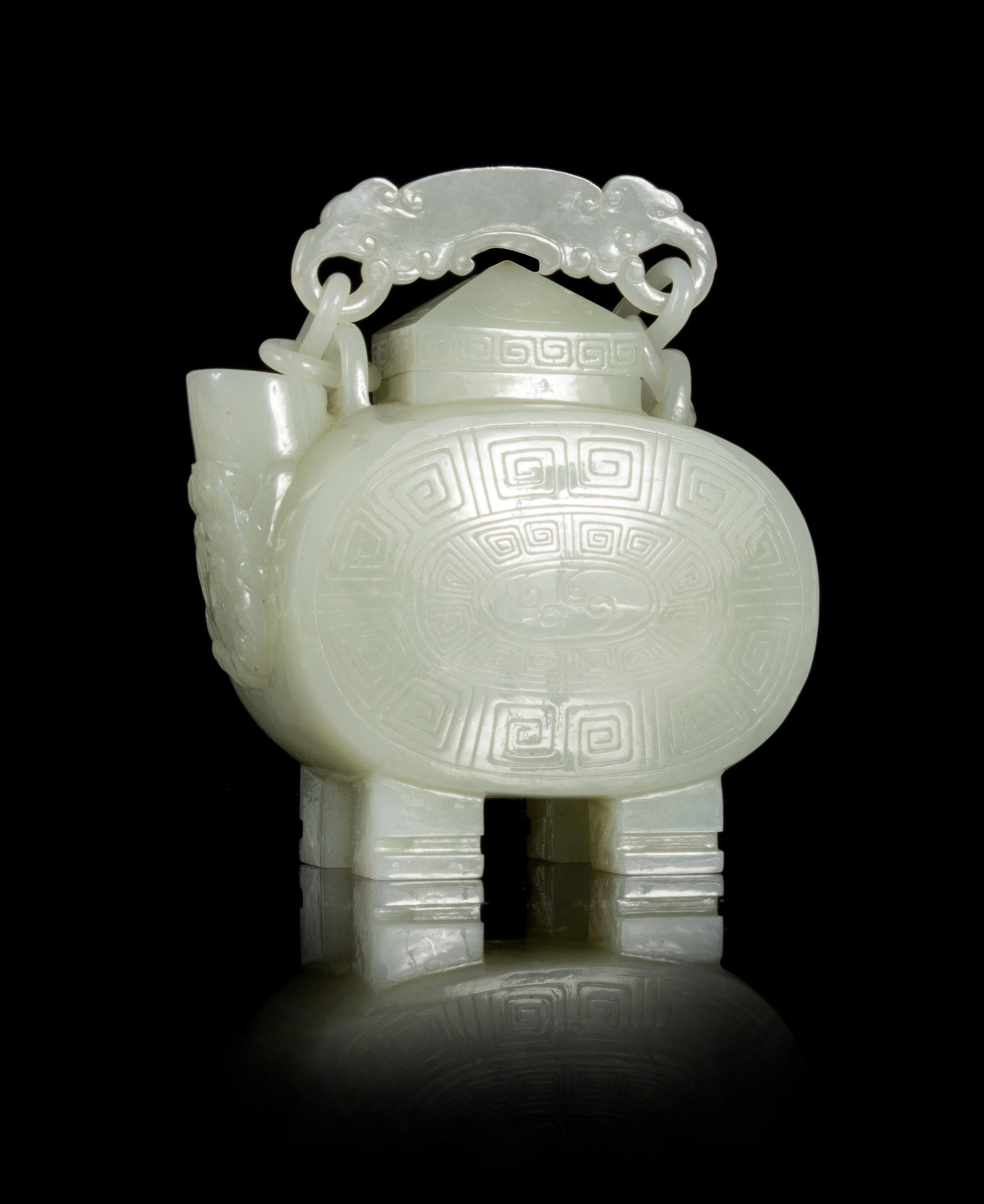 A Jade Teapot Height 3 1/2 inches.