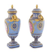 A Pair of Sèvres Porcelain Covered Urns