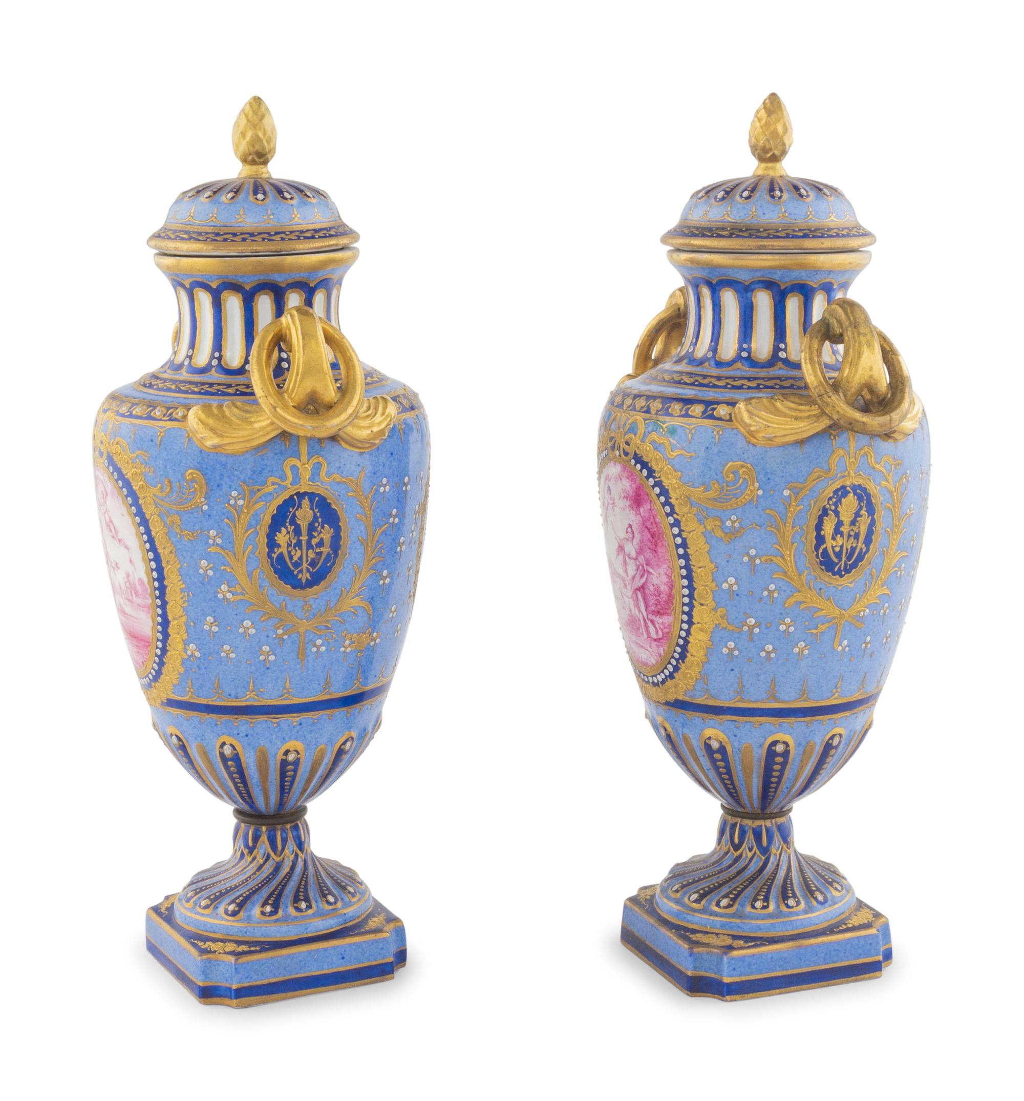 A Pair of Sèvres Porcelain Covered Urns