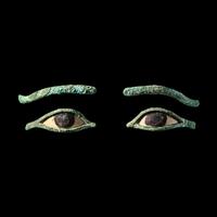 A Pair of Egyptian Bronze Eye Inlays