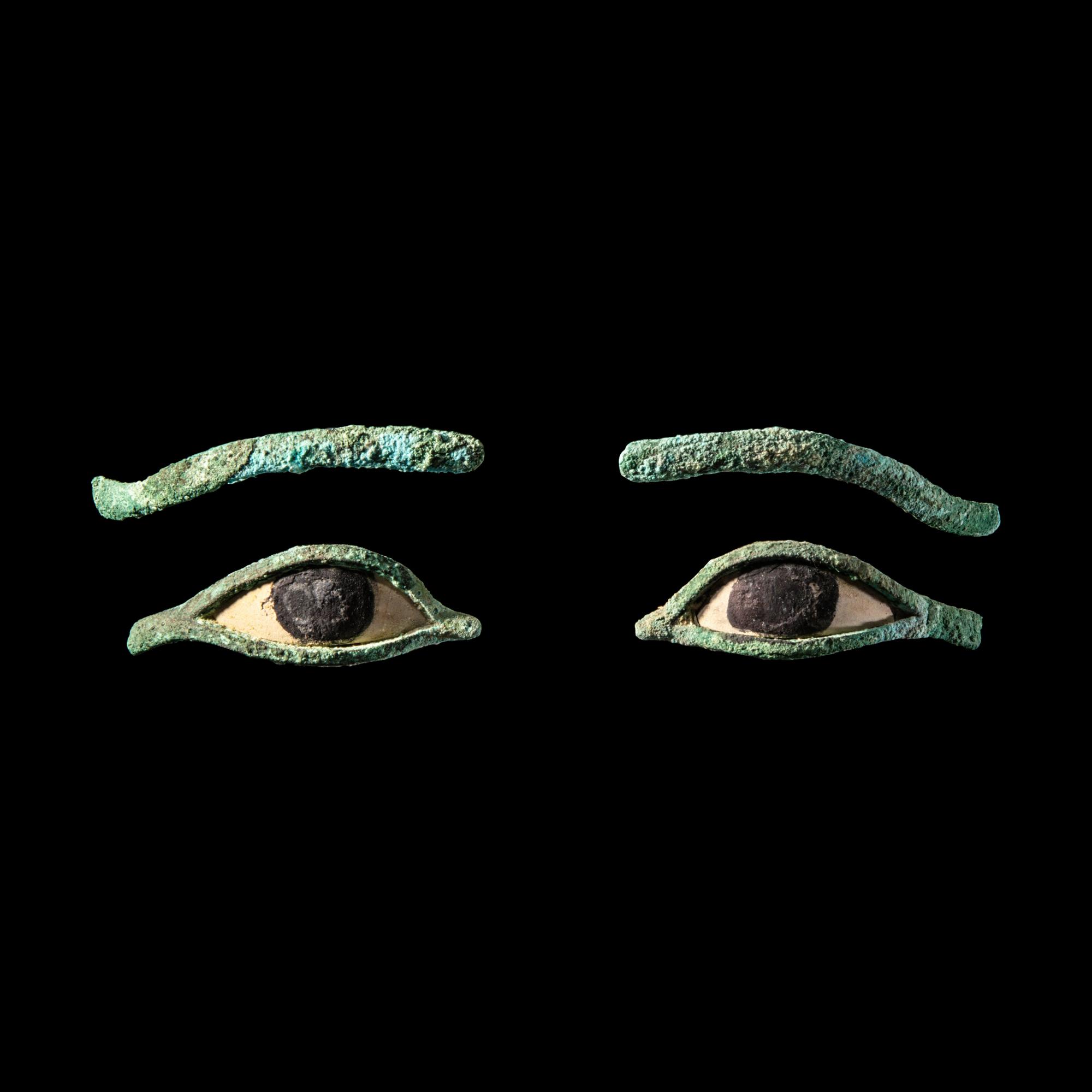 A Pair of Egyptian Bronze Eye Inlays