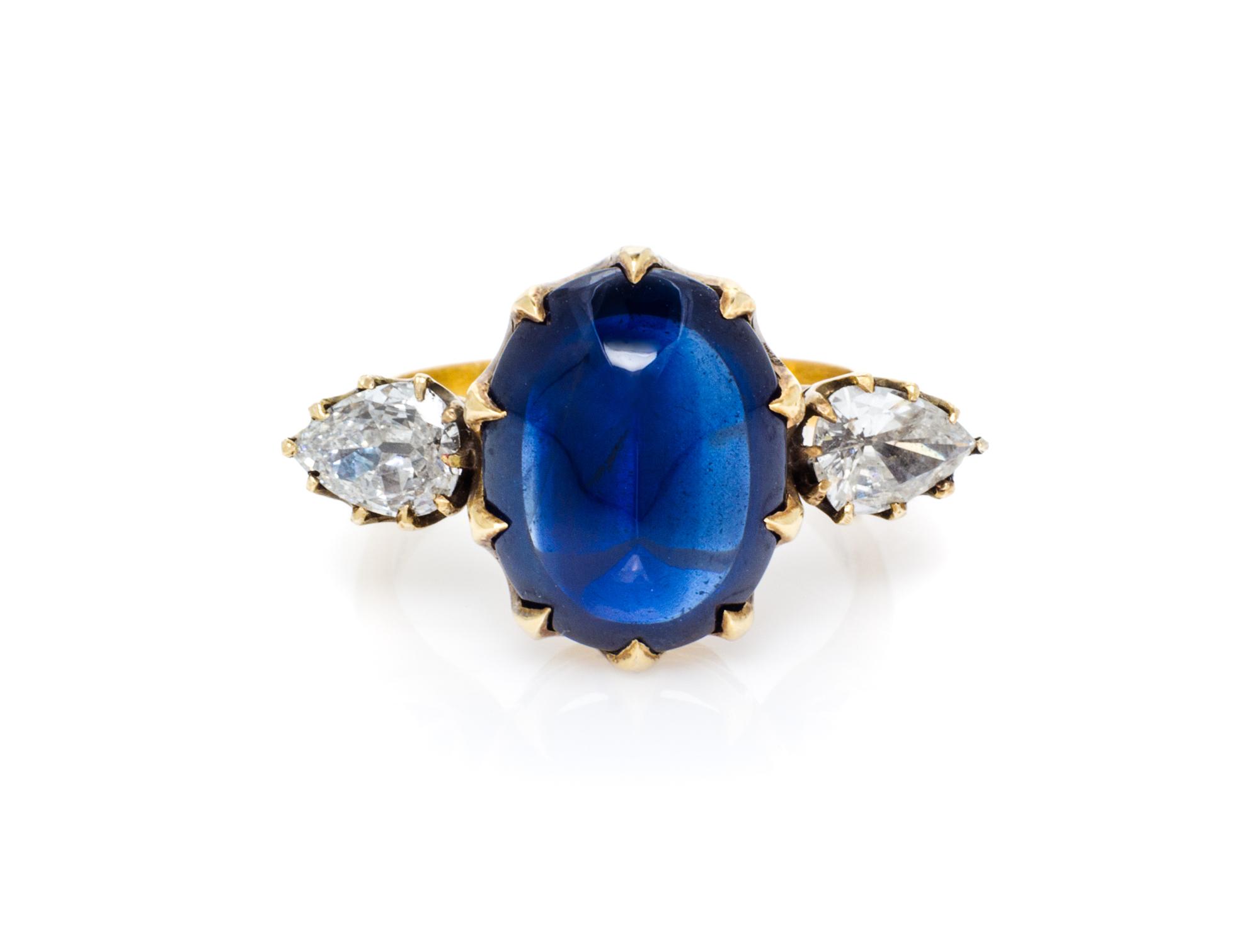 An 18 Karat Yellow Gold, Sapphire and Diamond Ring, 4.60 dwts.