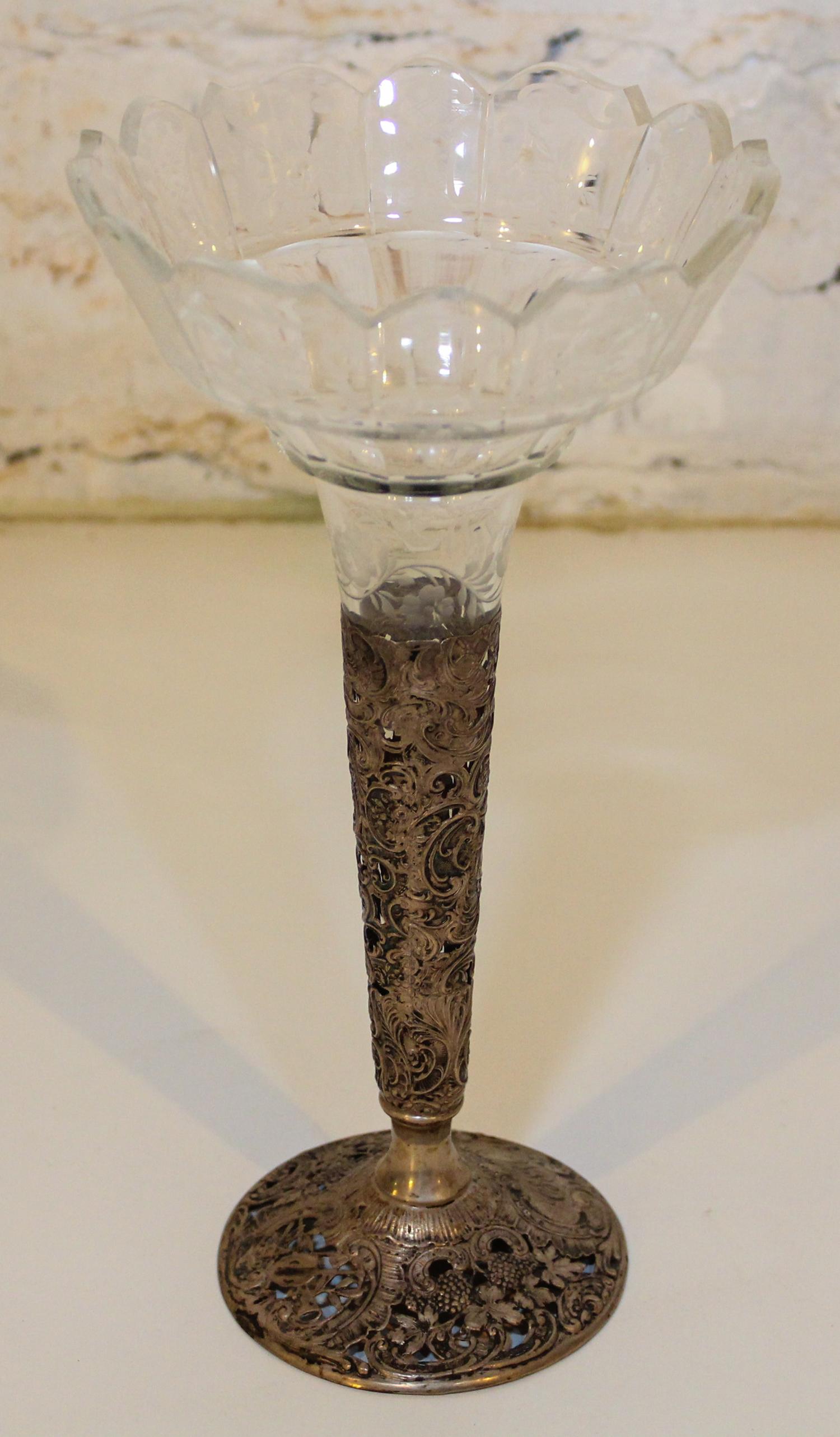 A German Silver and Glass Trumpet Vase. Height 11 1/4 inches.