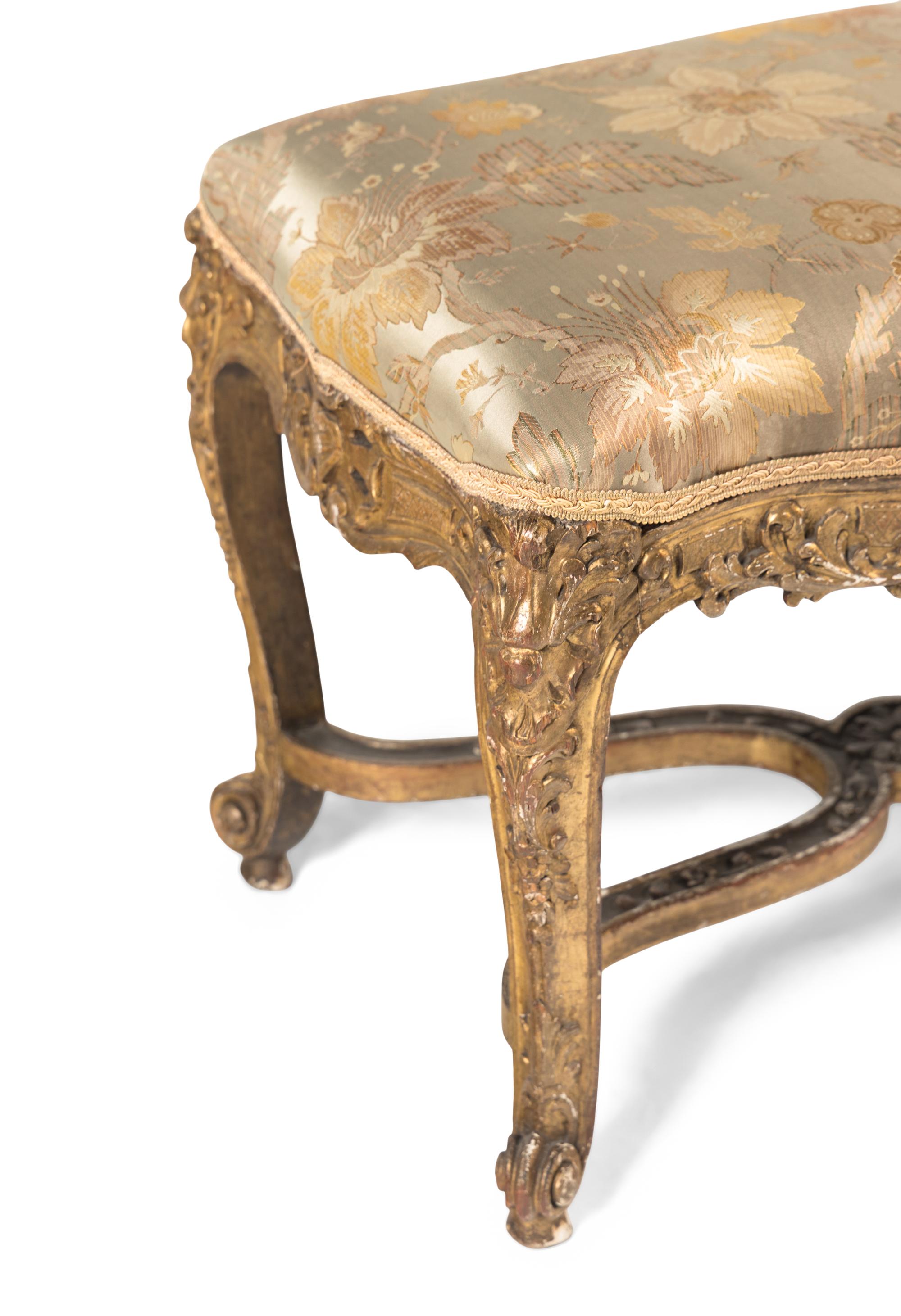 A Louis XV Carved Giltwood Window Bench