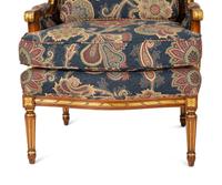 A Pair of Louis XVI Style Parcel Gilt Fruitwood Bergères