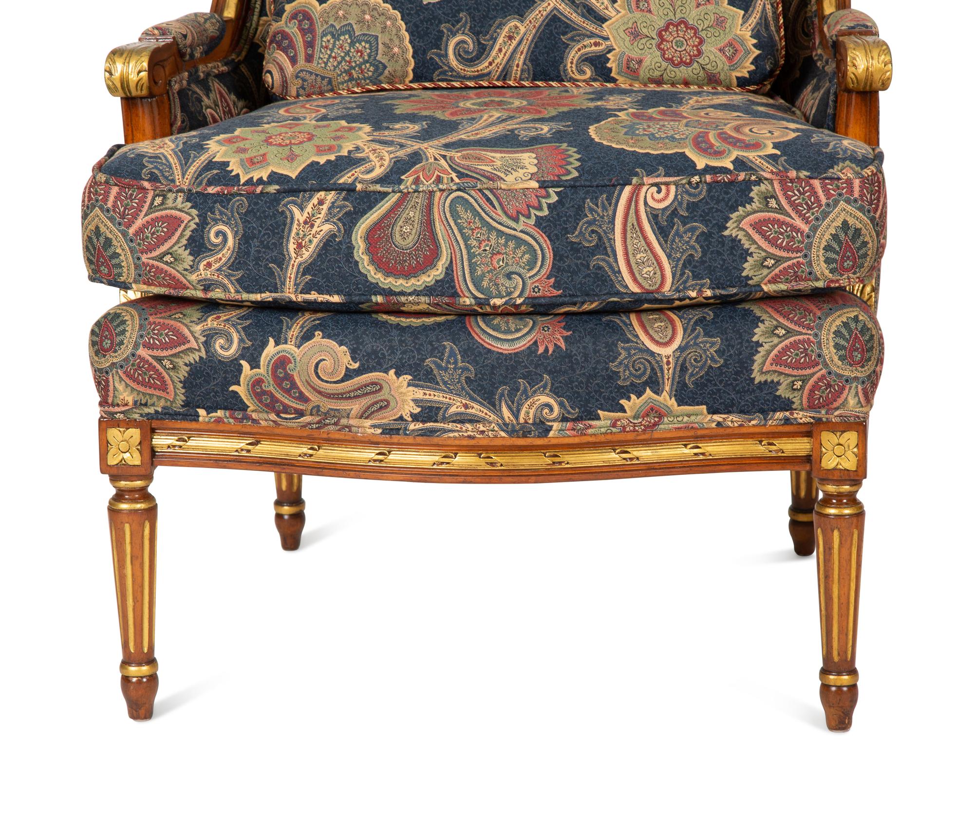 A Pair of Louis XVI Style Parcel Gilt Fruitwood Bergères