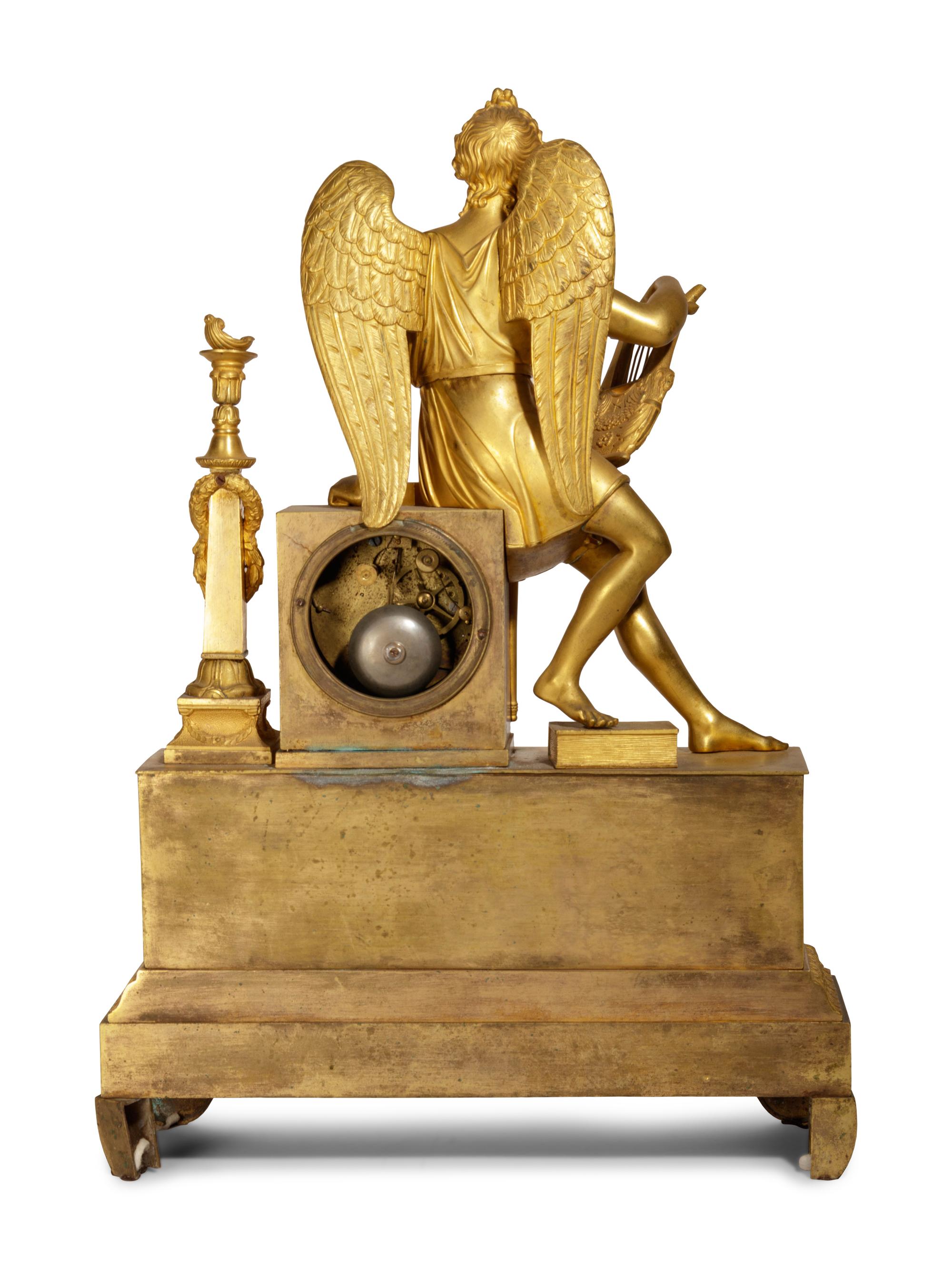 An Empire Gilt Bronze Figural Mantel Clock