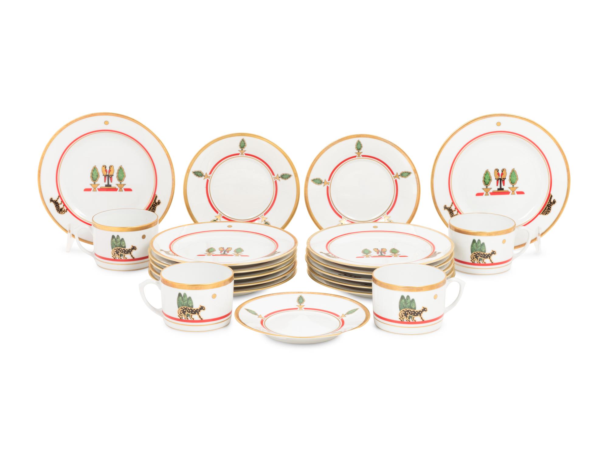 A Cartier La Maison de Louis Porcelain Dinner Service for Twelve
