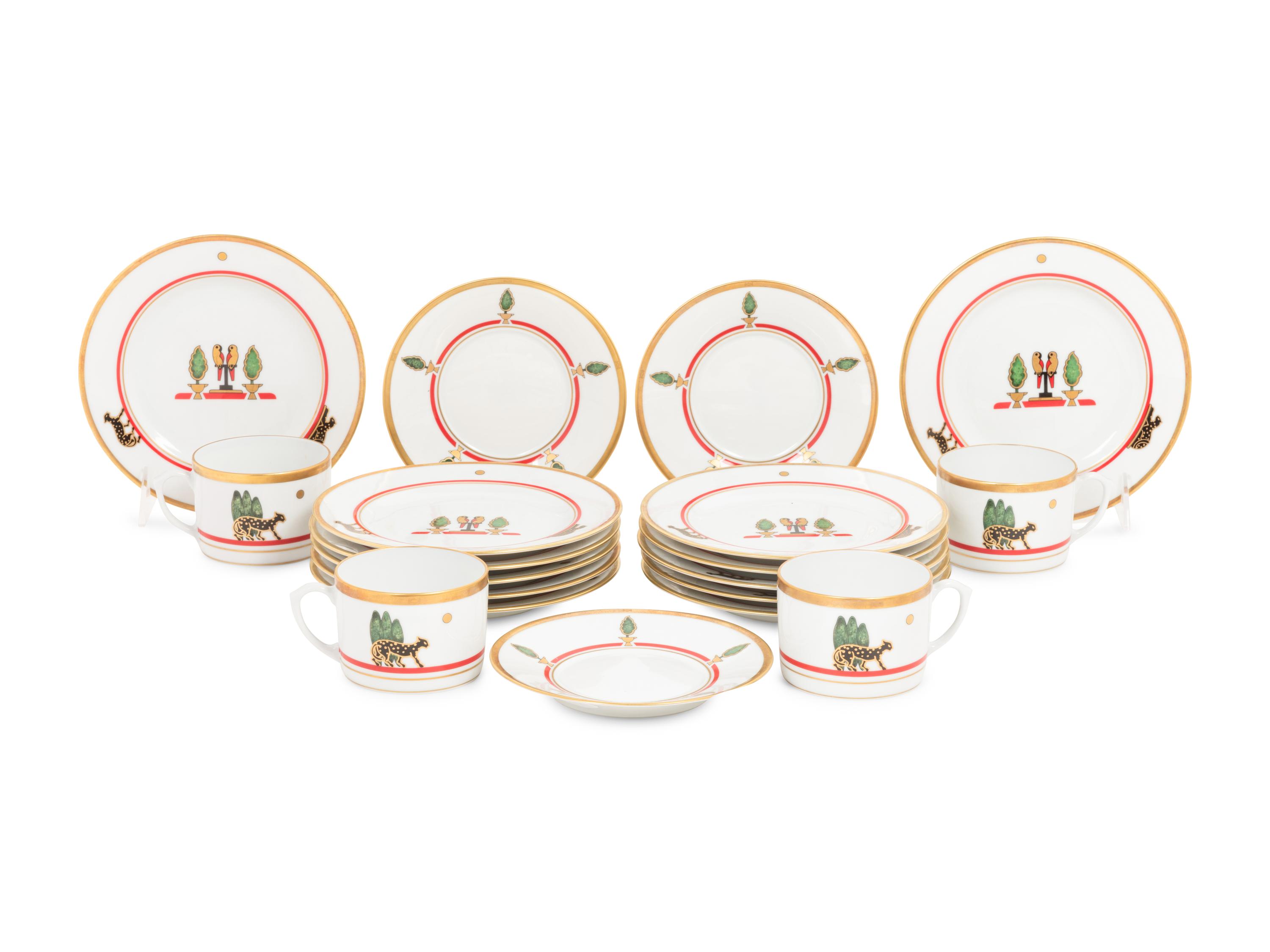A Cartier La Maison de Louis Porcelain Dinner Service for Twelve