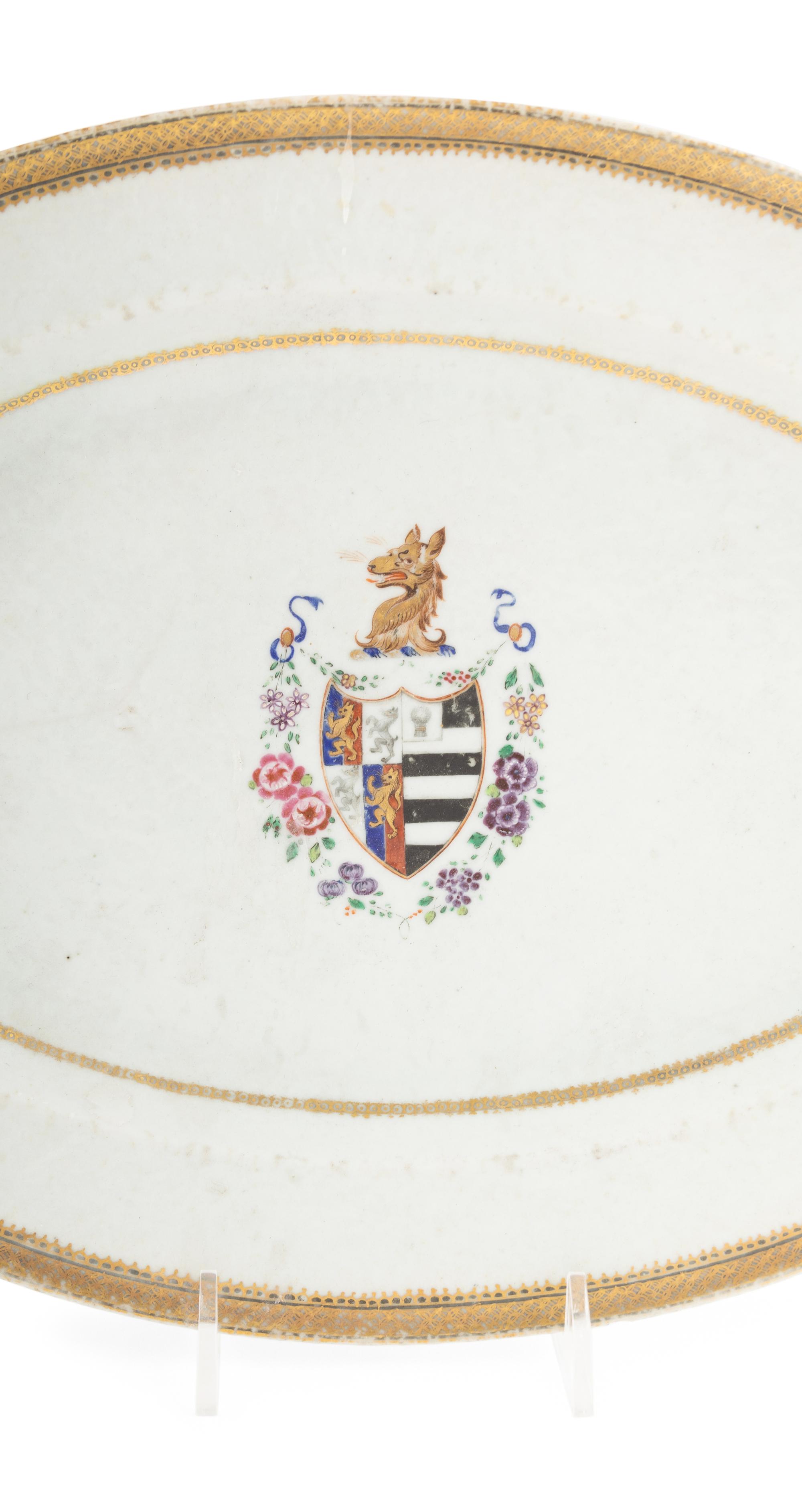 A Pair of Chinese Export Porcelain Armorial Platters
