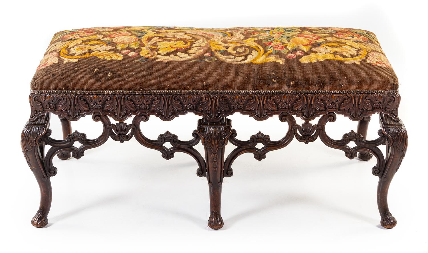 A French Carved Walnut Window Seat Height 21 x width 45 x depth 21 inches. — EARLY 20TH CENTURY