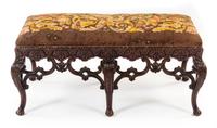 A French Carved Walnut Window Seat Height 21 x width 45 x depth 21 inches. — EARLY 20TH CENTURY