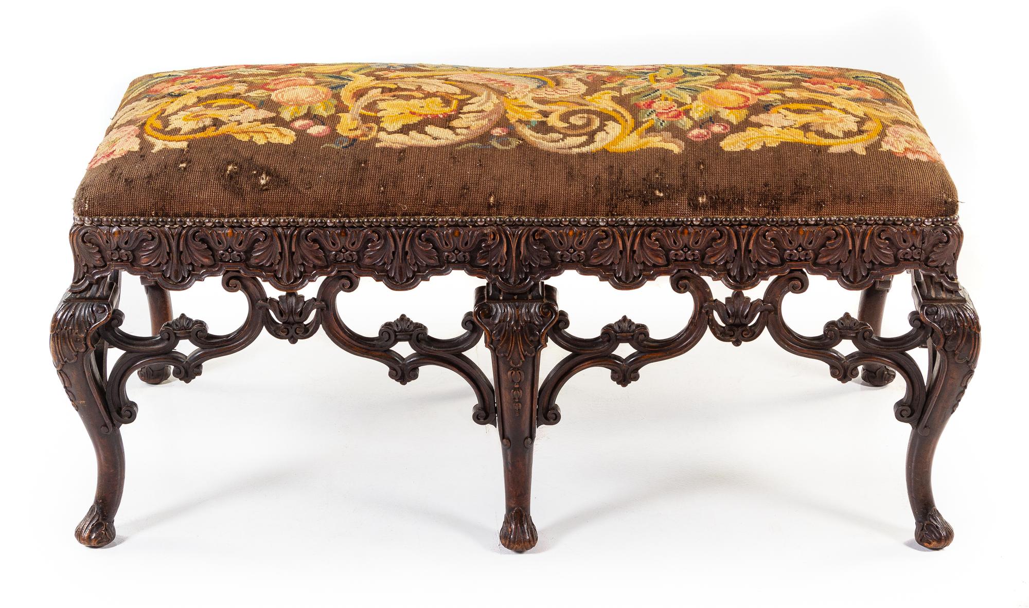 A French Carved Walnut Window Seat Height 21 x width 45 x depth 21 inches. — EARLY 20TH CENTURY