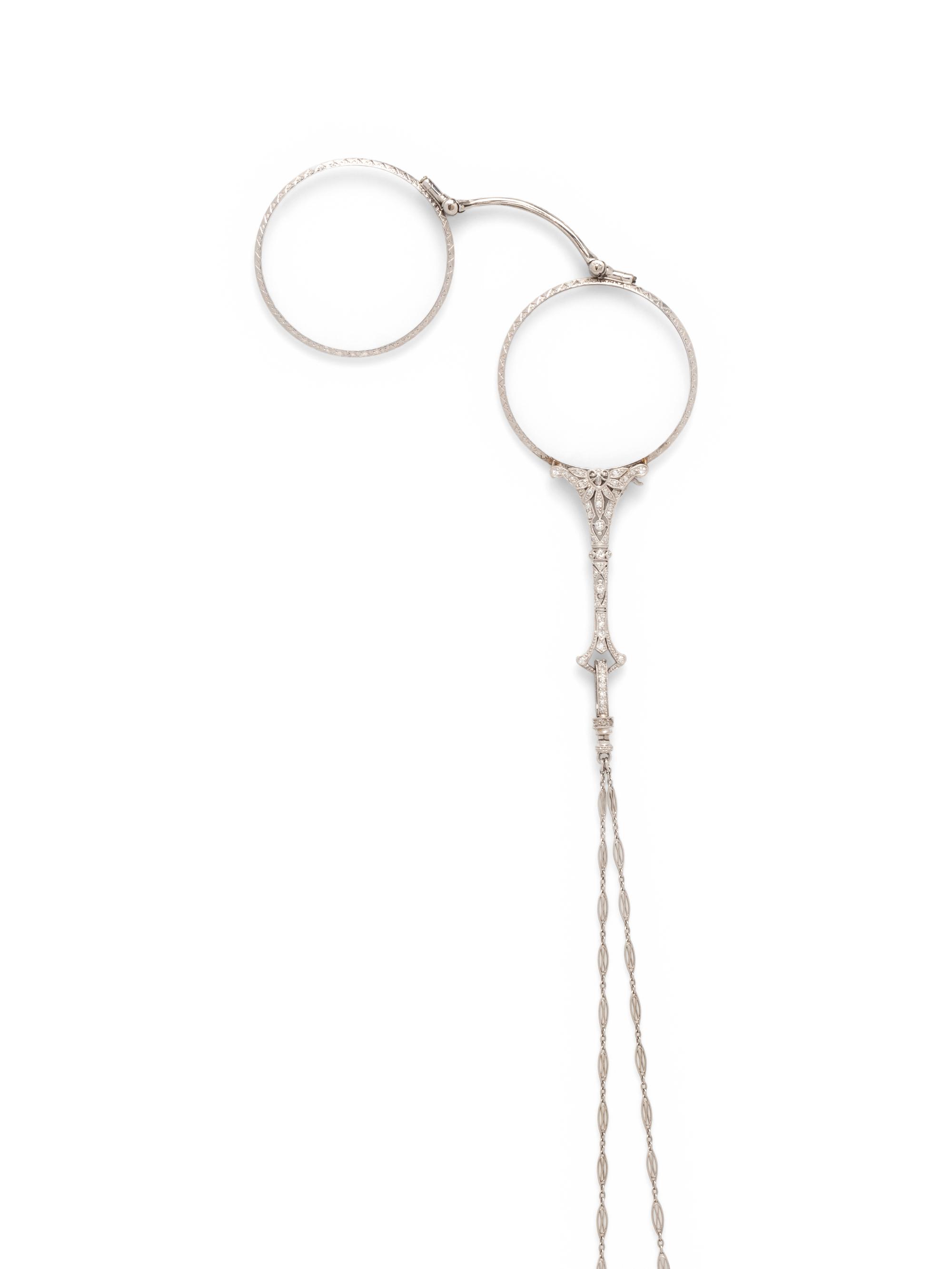 EDWARDIAN, PLATINUM AND DIAMOND LORGNETTE WITH LONGCHAIN