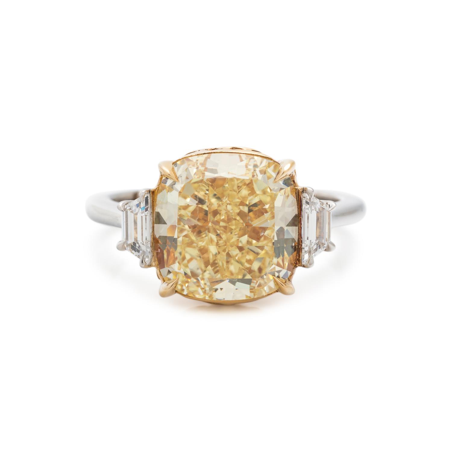 FOREVERMARK, FANCY YELLOW DIAMOND AND DIAMOND RING
