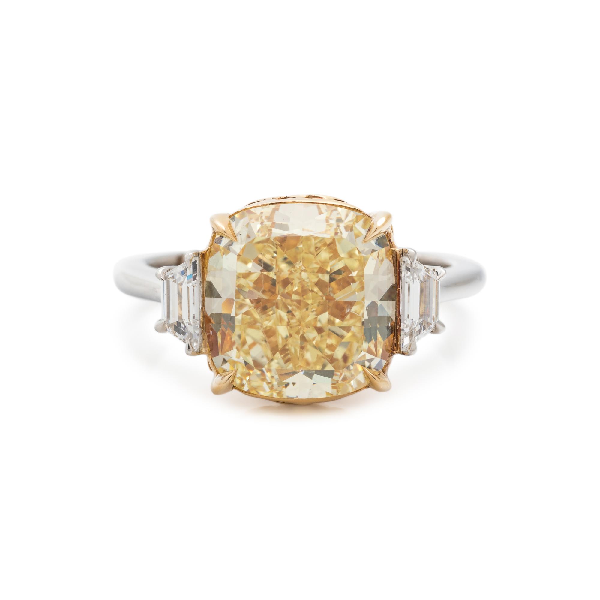 FOREVERMARK, FANCY YELLOW DIAMOND AND DIAMOND RING