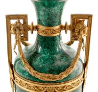 A Louis XVI Style Gilt Metal Mounted Malachite Veneered Urn