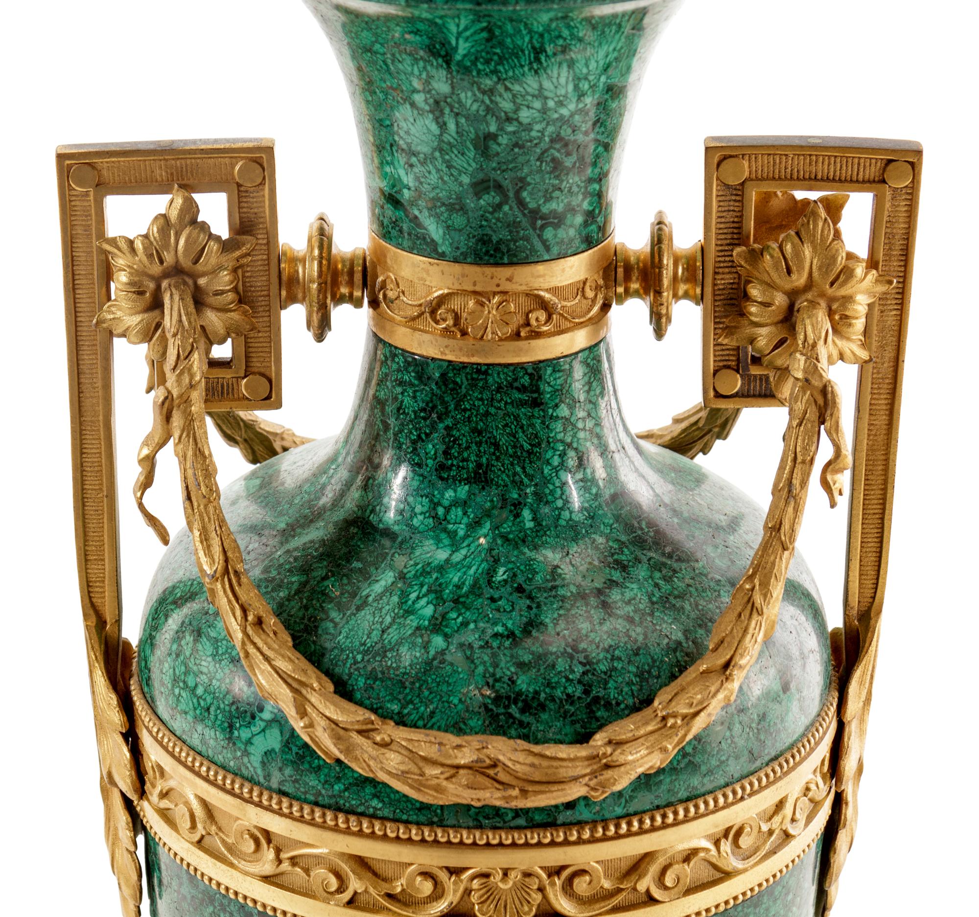 A Louis XVI Style Gilt Metal Mounted Malachite Veneered Urn