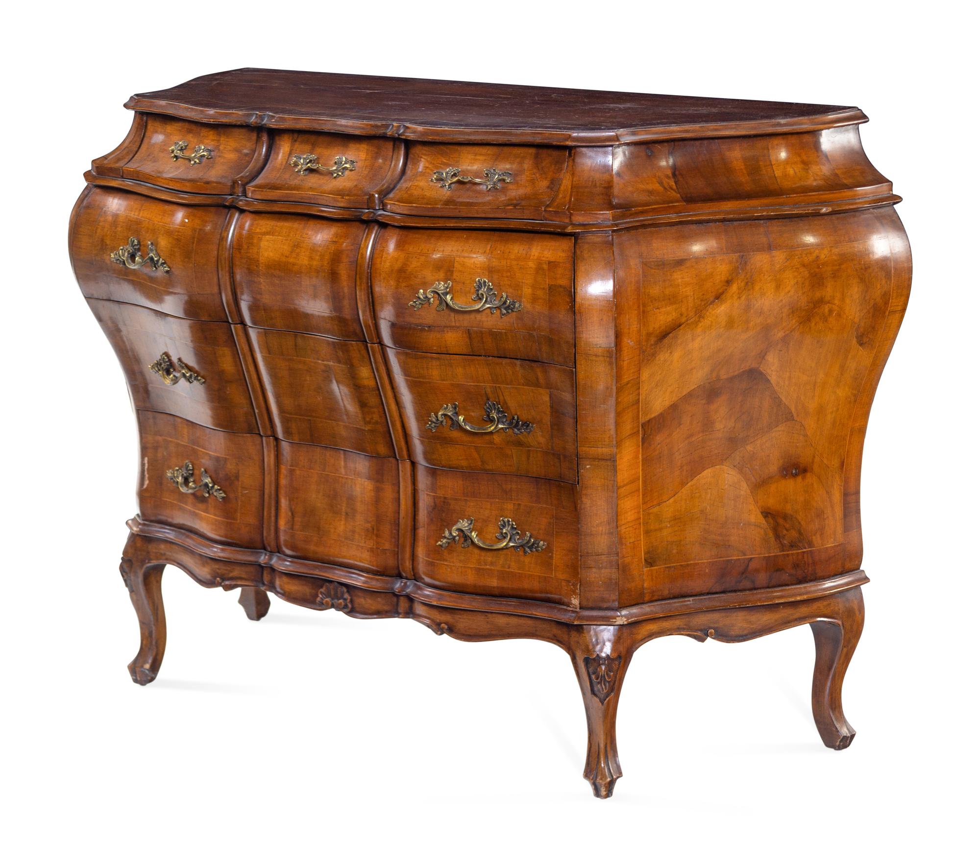 An Italian Walnut Bombe Commode