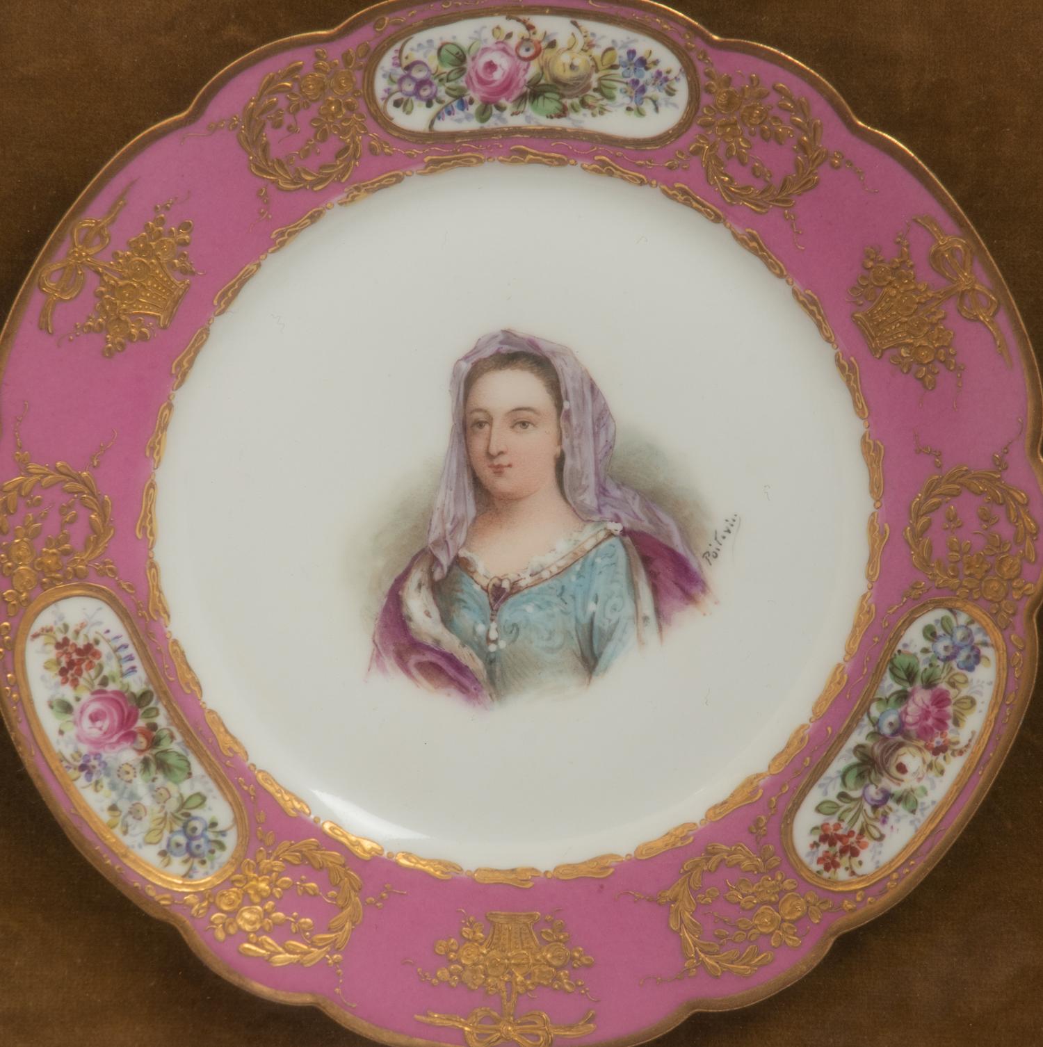 A Group of Seven Framed Sèvres Style Porcelain Plates