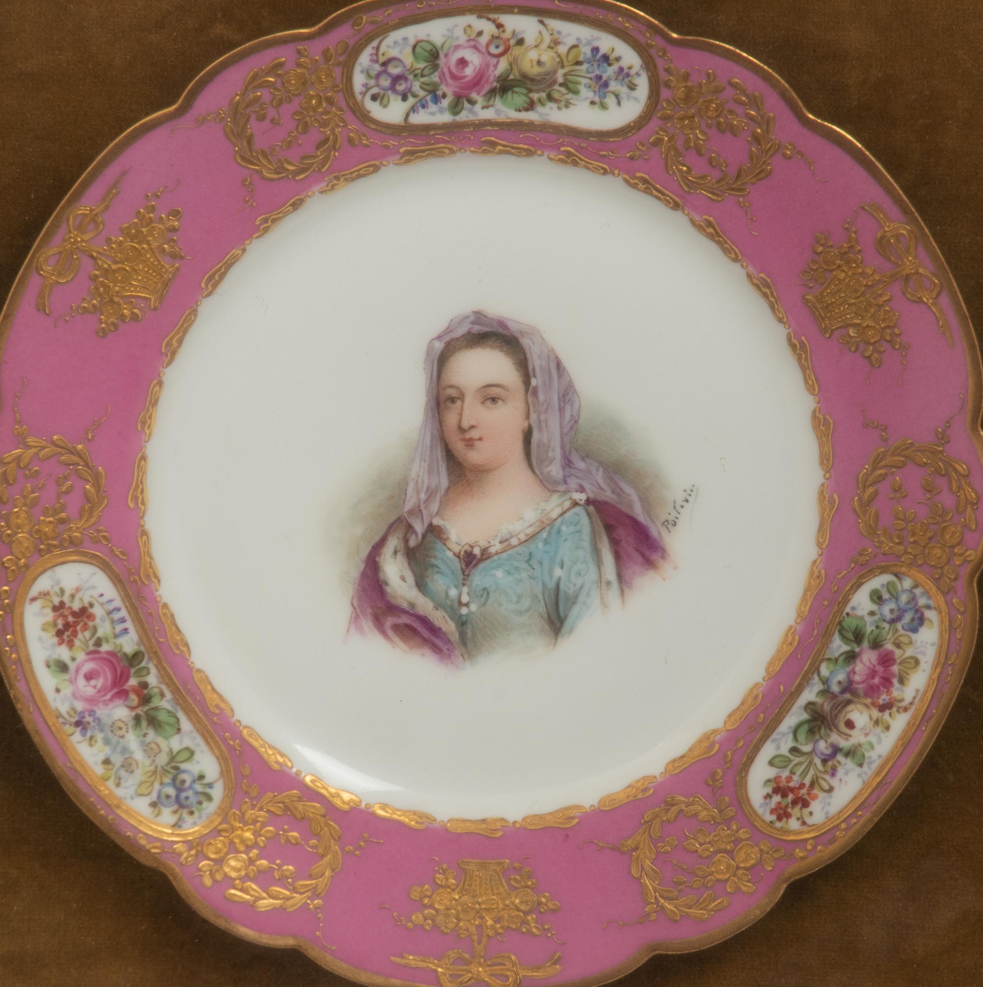 A Group of Seven Framed Sèvres Style Porcelain Plates
