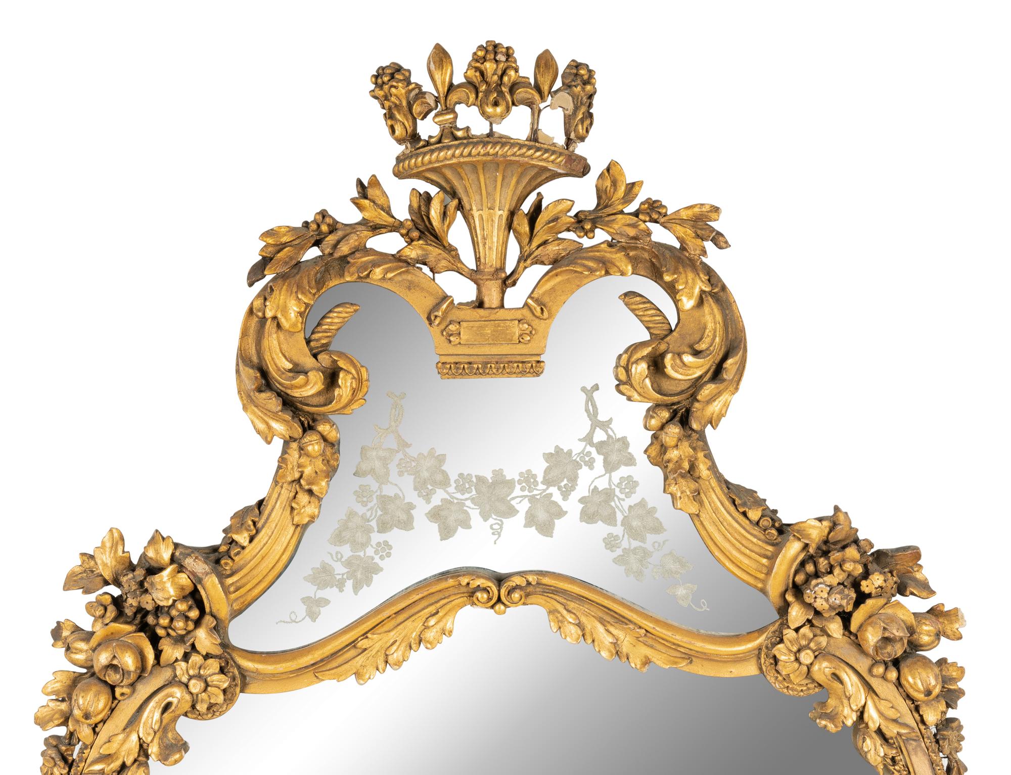 A Continental Giltwood and Etched Glass Mirror