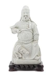 A Chinese Blanc-de-Chine Porcelain Figure 18TH/19TH CENTURY Height overall 11 inches. — 18TH/19TH CENTURY