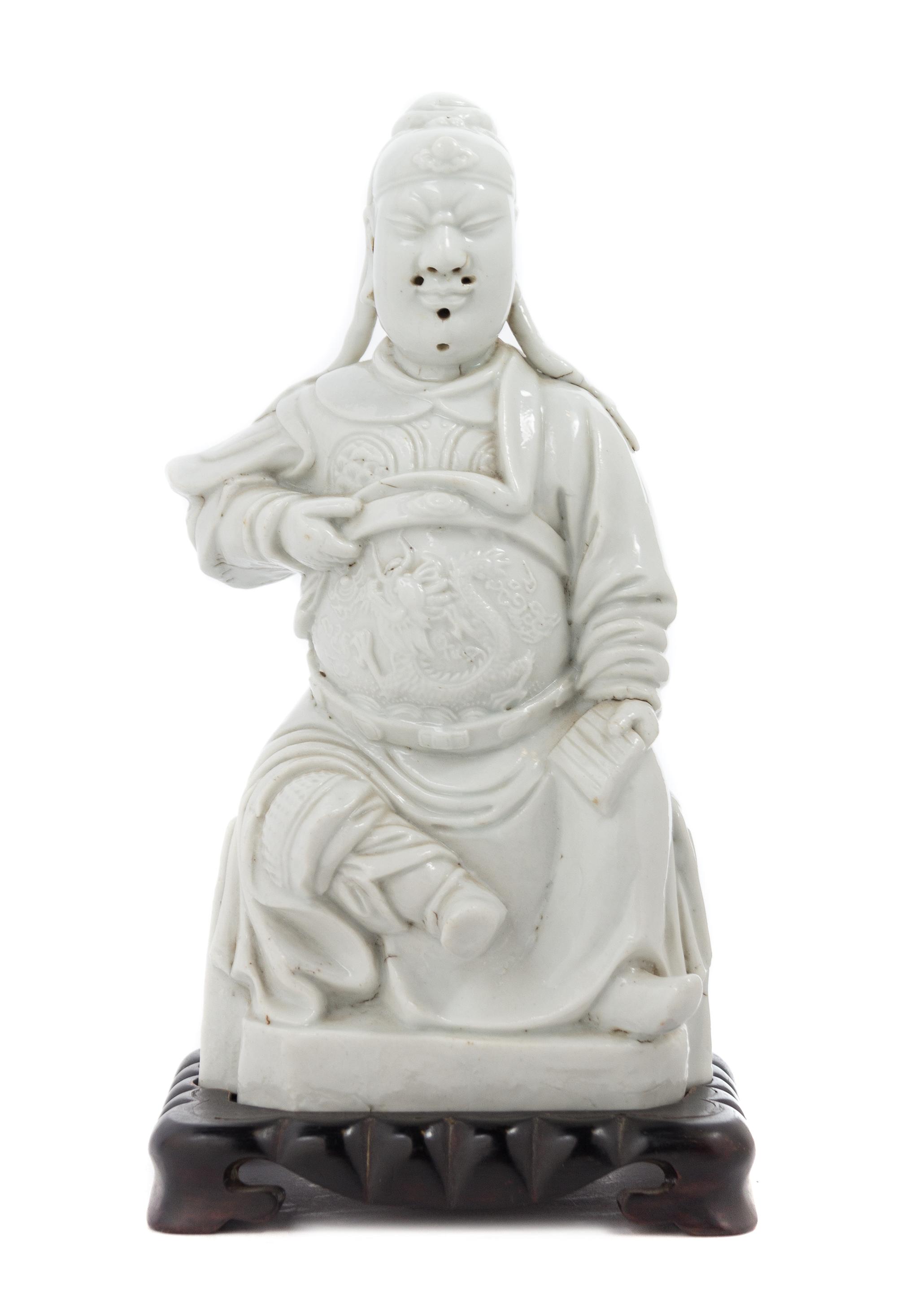 A Chinese Blanc-de-Chine Porcelain Figure 18TH/19TH CENTURY Height overall 11 inches. — 18TH/19TH CENTURY