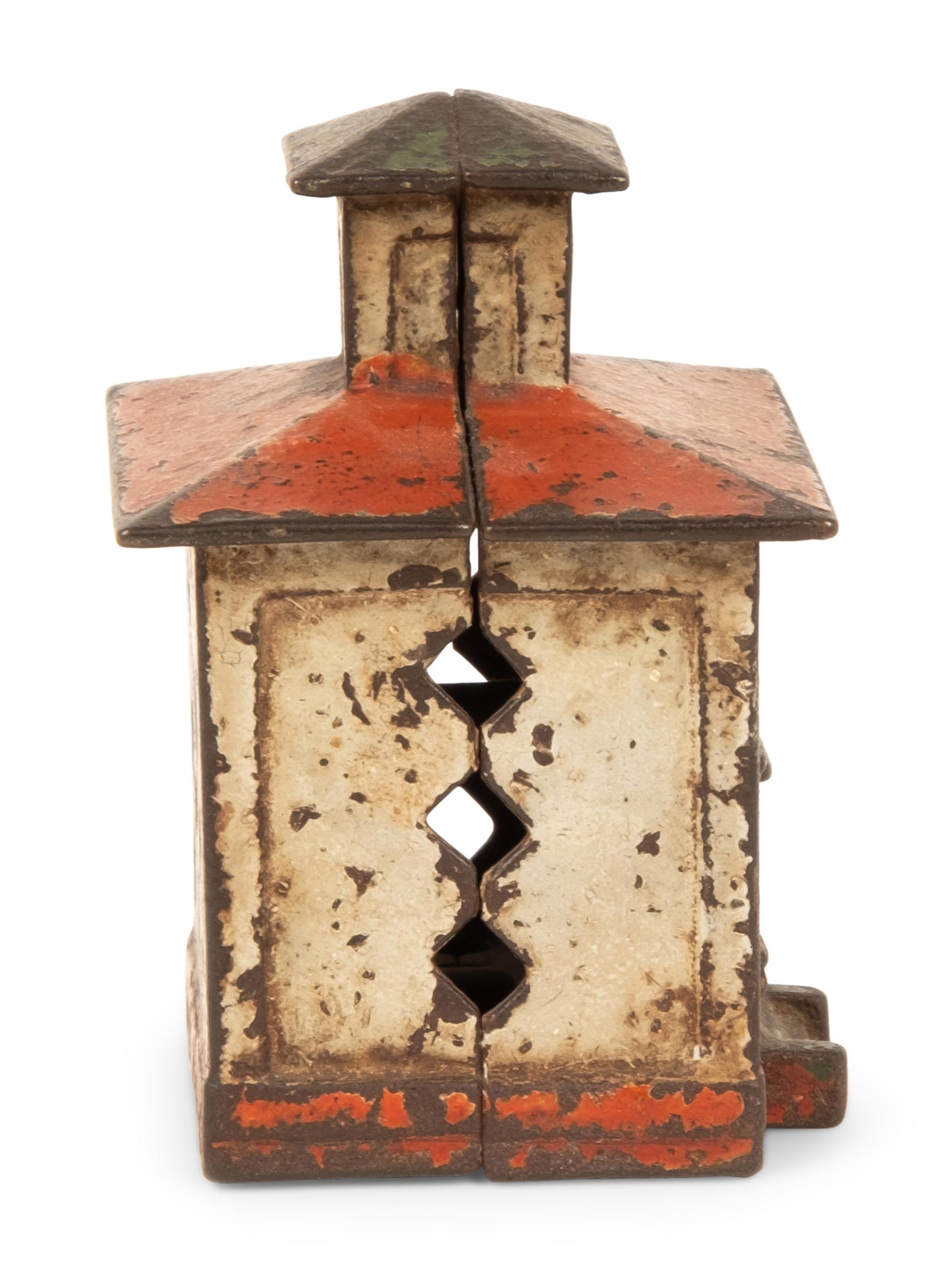 An Old Honesty Cast Iron Indian Cigar Bank, PLUS