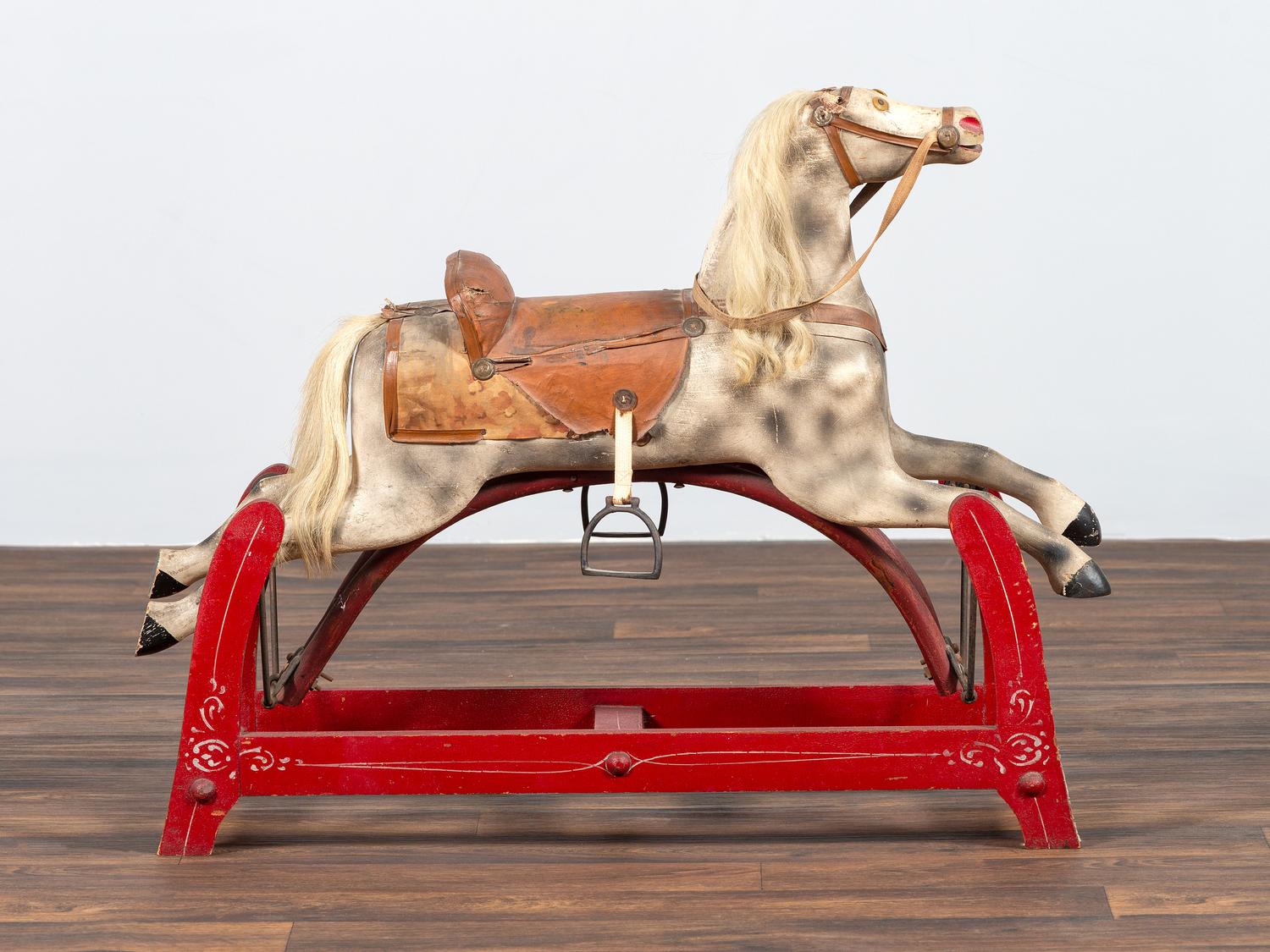 A Carved and Painted Wood Child's Riding Horse Toy