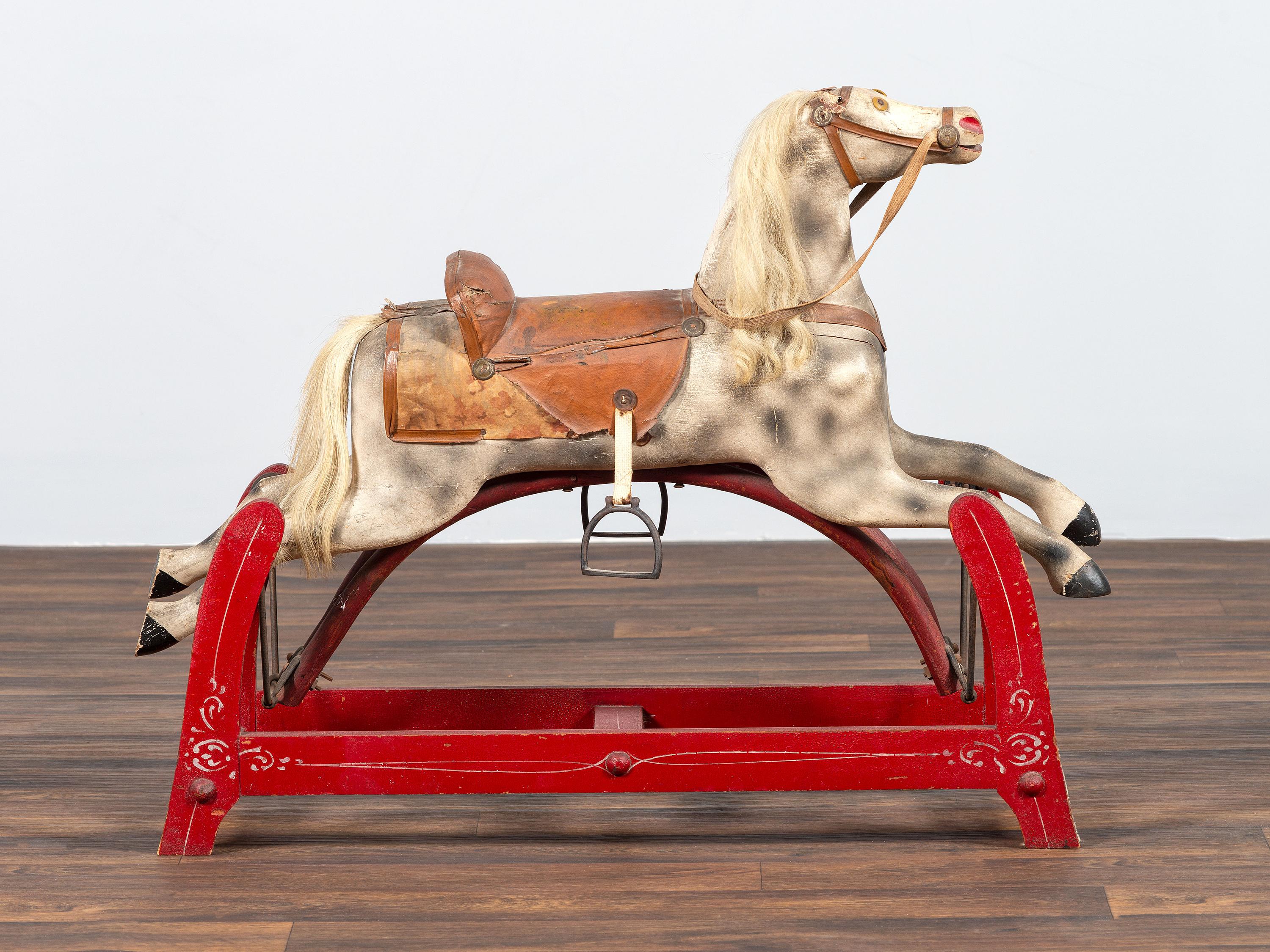 A Carved and Painted Wood Child's Riding Horse Toy