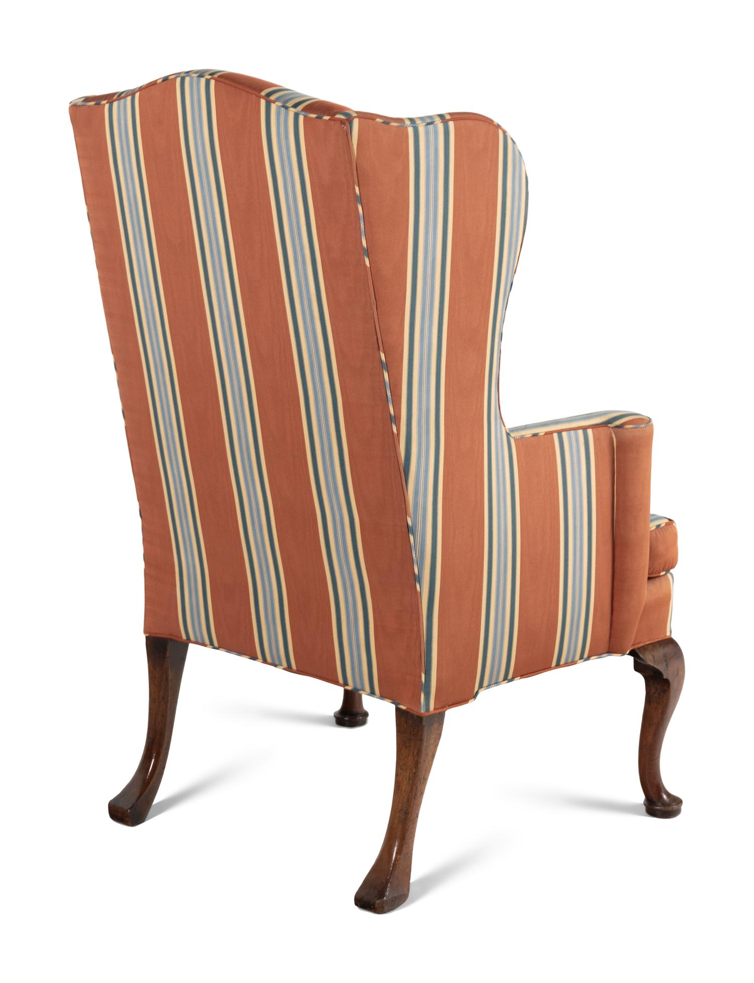 A Queen Anne Walnut Wingback Armchair