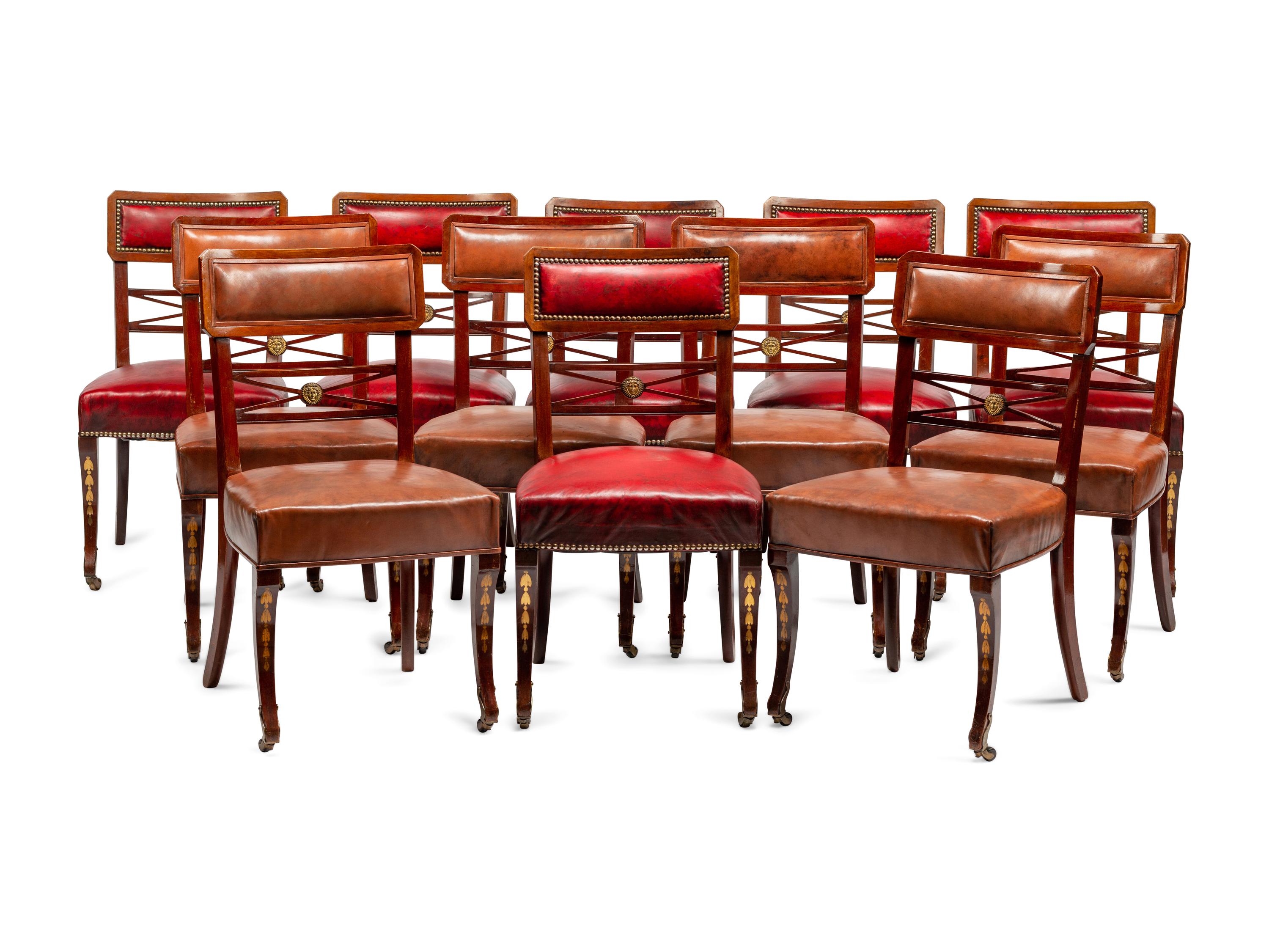 A Set of Twelve Baltic Neoclassical Style Leather-Upholstered Mahogany Dining Chairs