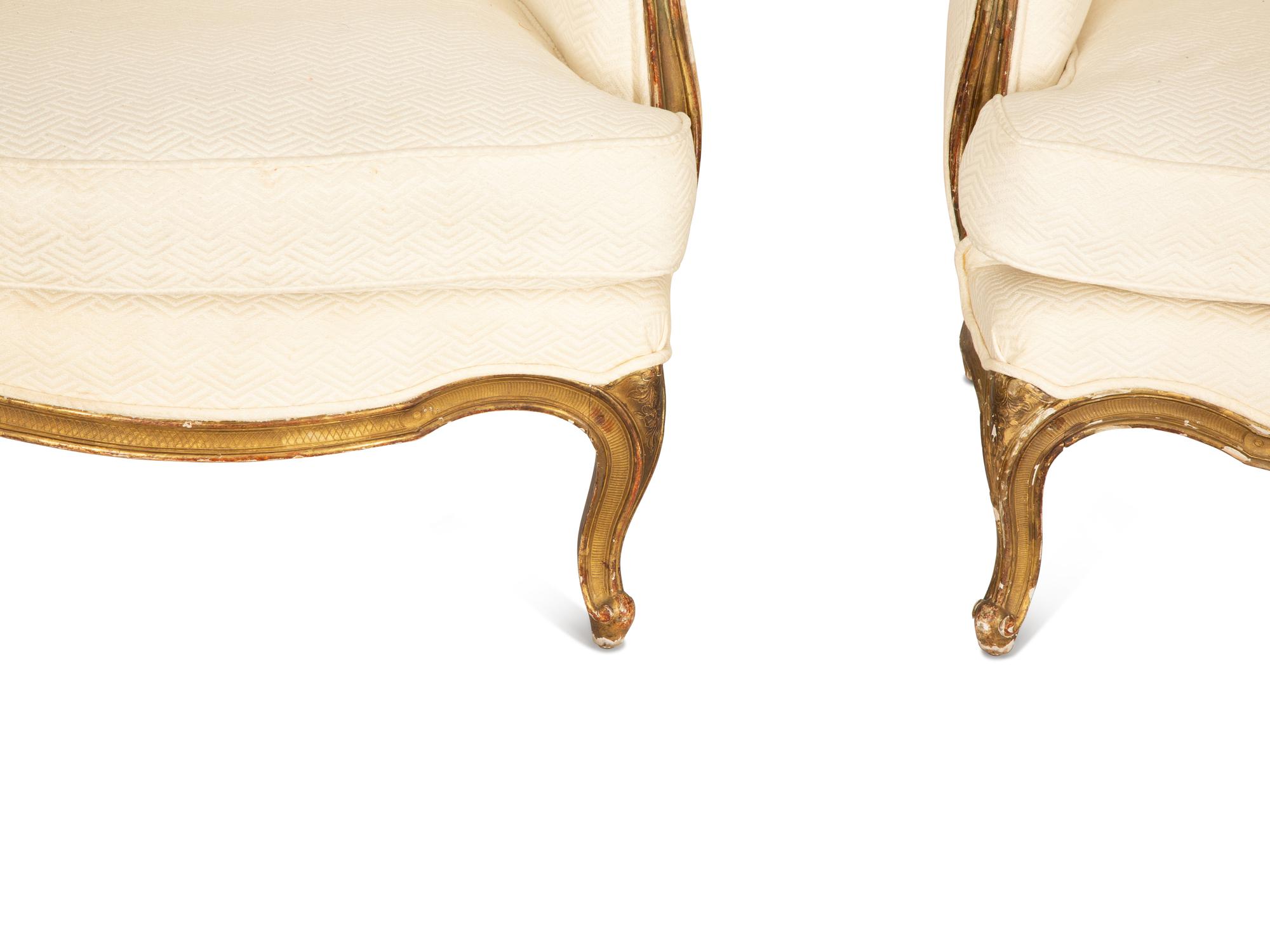 A Pair of Louis XV Style Giltwood Bergères