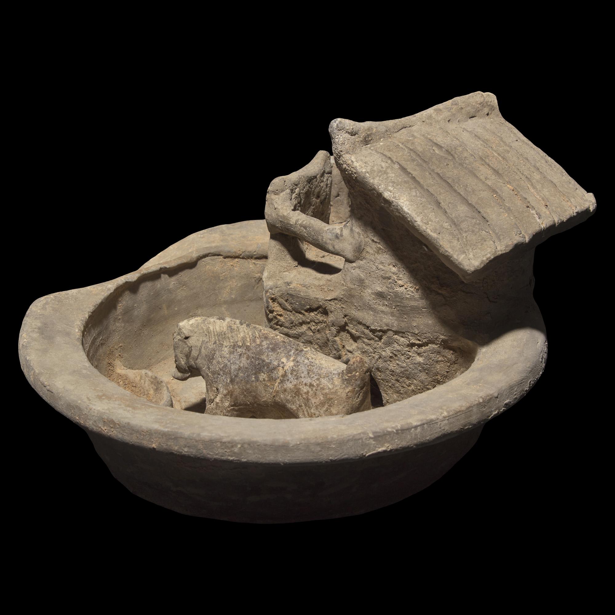 A Chinese Grey Pottery Model of a Pigsty with Occupant, Han Dynasty 漢 陶豬圈