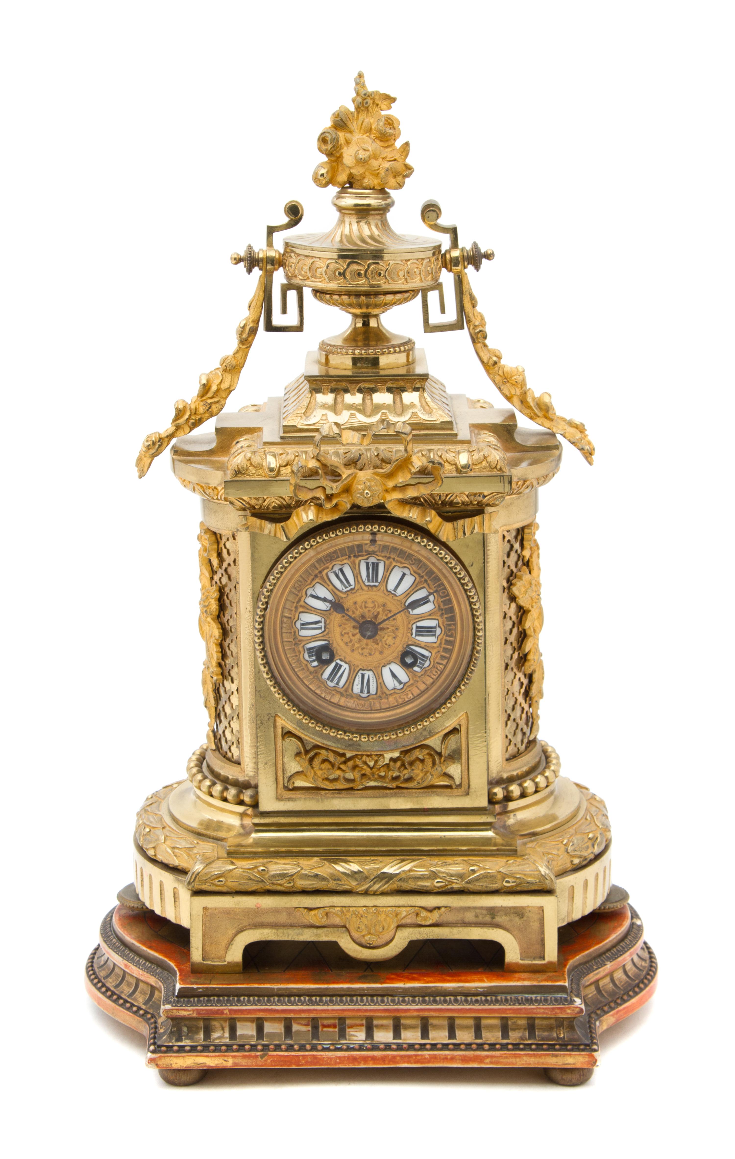 A French Gilt Bronze Mantel Clock Height 18 x width 11 x depth 7 1/2 inches. — 19TH CENTURY