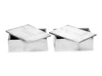 A Pair of American Silver Cigarette Boxes