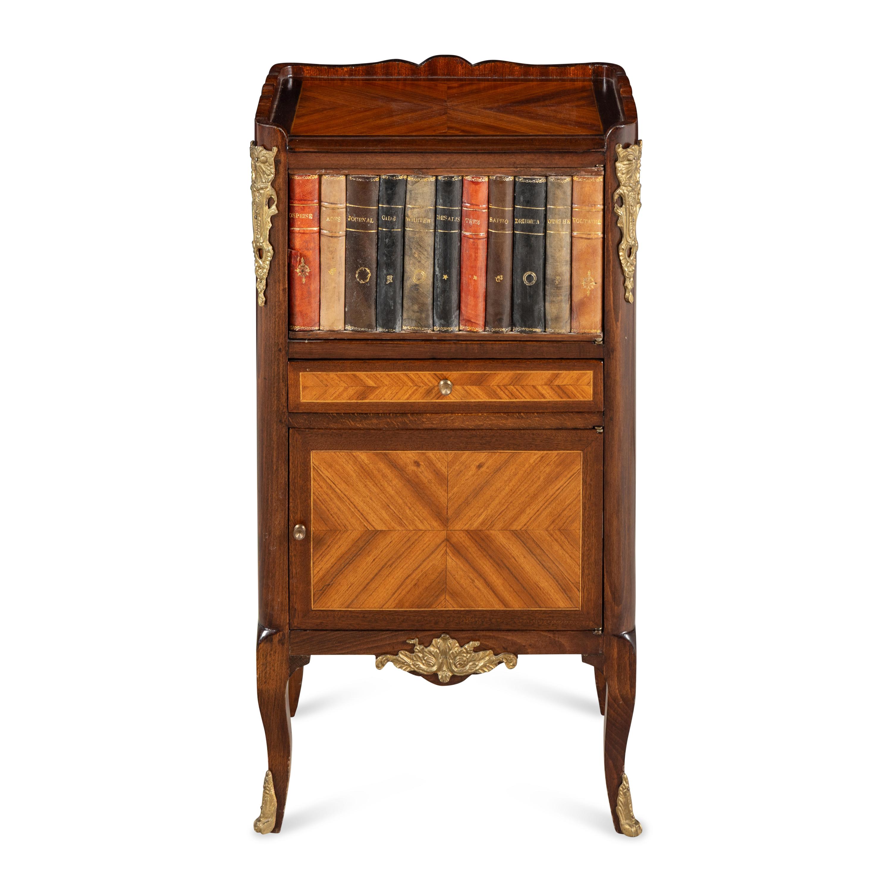 A Louis XV/XVI Transitional Style Faux Book-Front Cabinet