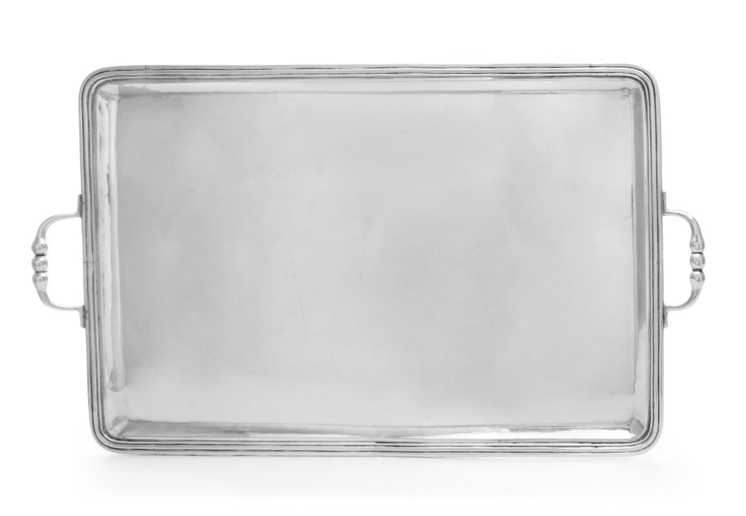 A Mexican Silver Serving Tray, Sanborns, Mexico City, of rectangular form with a reeded border and knopped handles.