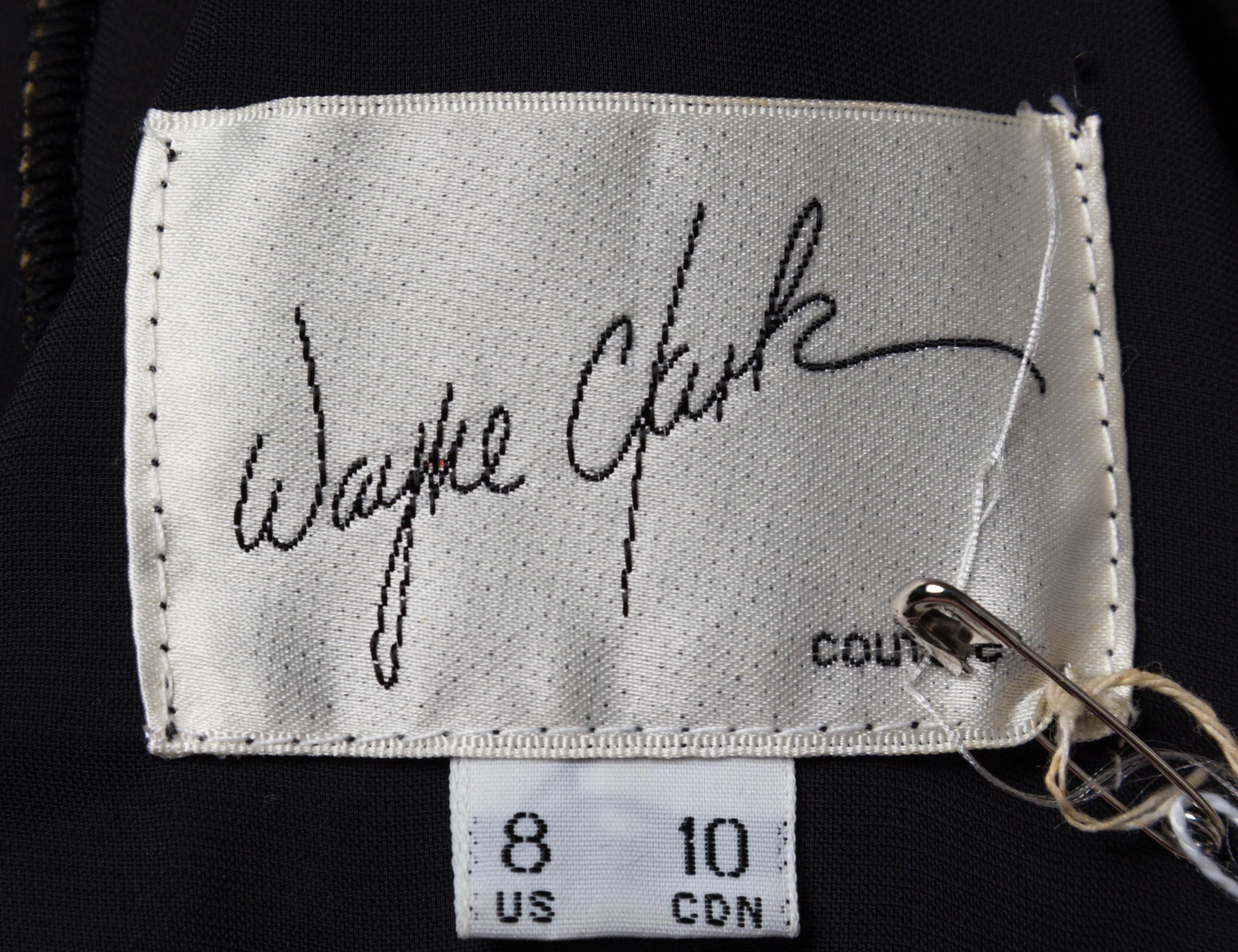 A Wayne Clark Black Velvet Peplum Top, Size 8.