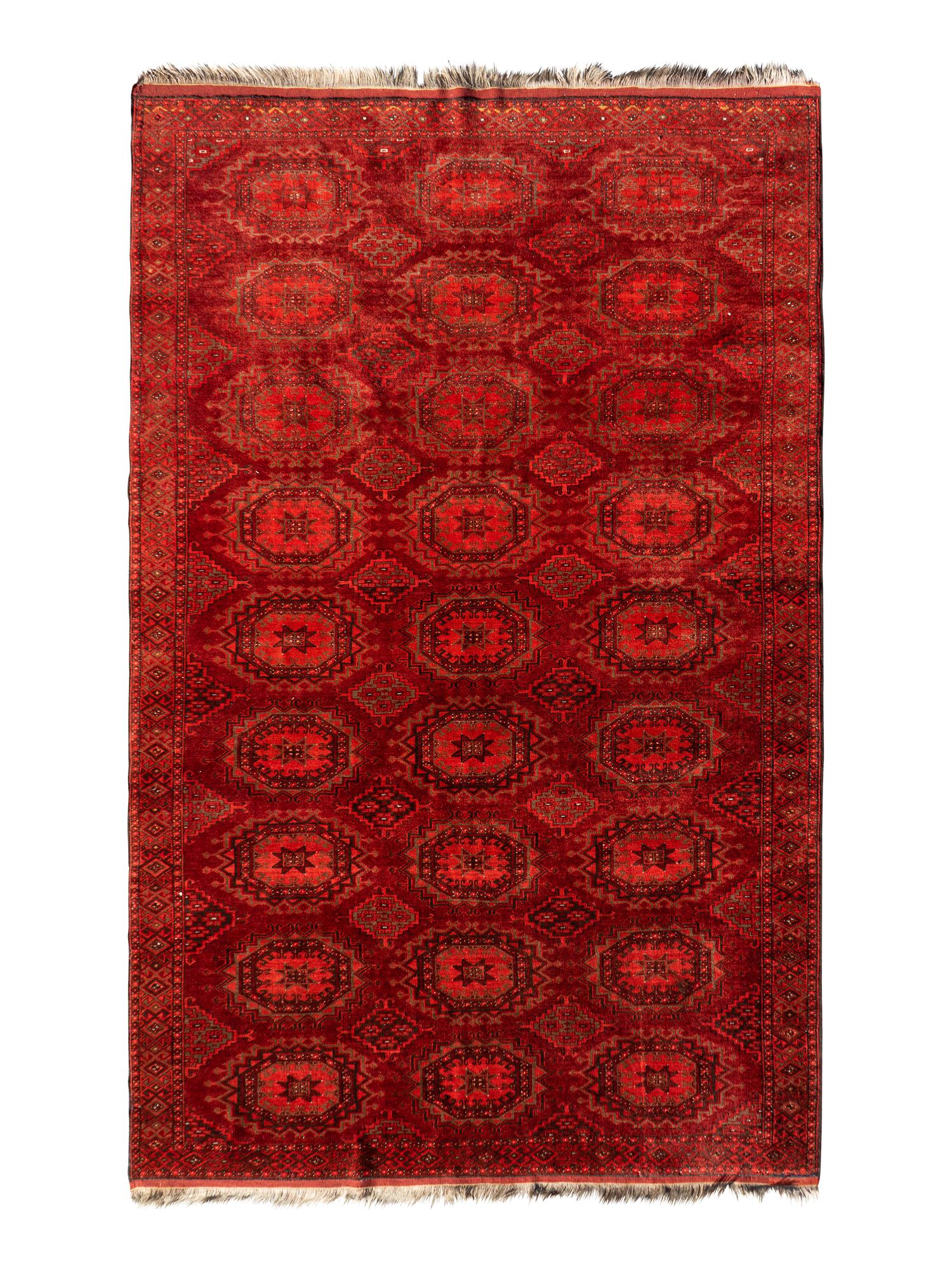 A Bokhara Wool Rug — 20TH CENTURY