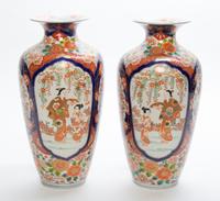 A Pair of Japanese Porcelain Vases Height 14 1/2 inches.