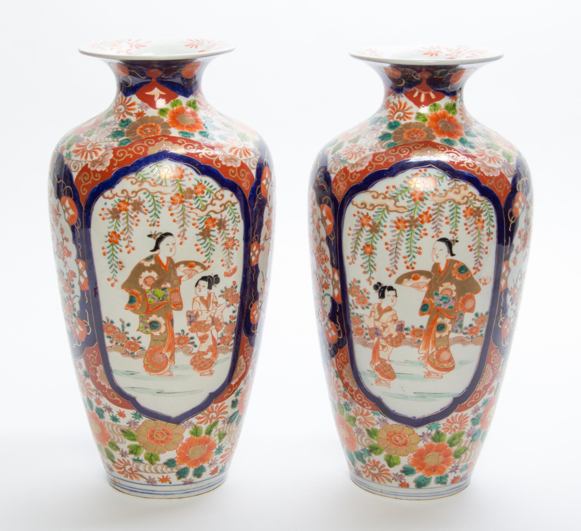 A Pair of Japanese Porcelain Vases Height 14 1/2 inches.